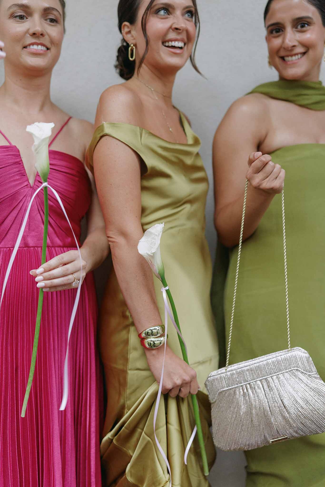 Bridesmaids with white calla lilies in coloured silk gowns at Domaine Rocabella, Cote d'Azur