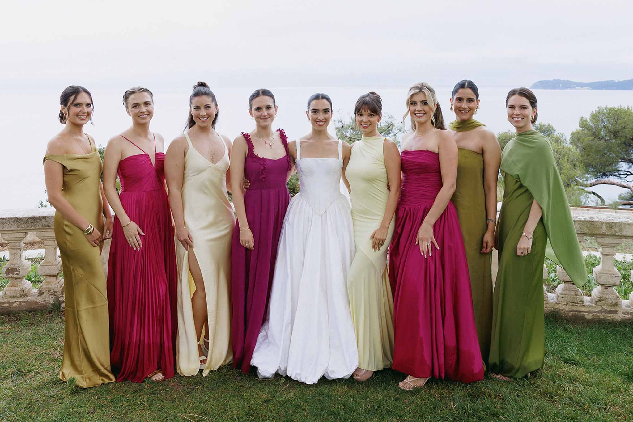 Bride with eight bridesmaids on Mediterranean terrace at Domaine Rocabella, Cote d'Azur