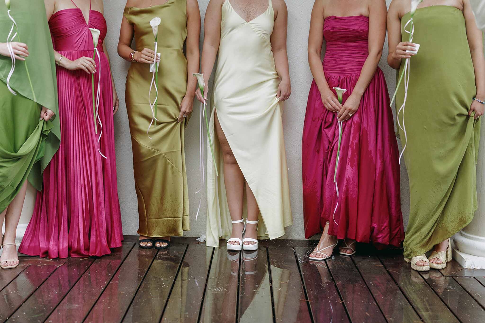 Bridesmaids in coloured gowns with calla lilies at Domaine Rocabella, Cote d'Azur
