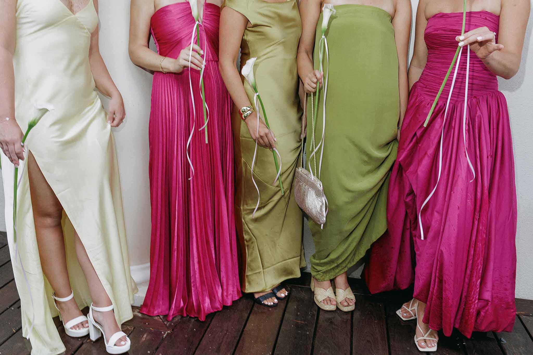 Bridesmaids' mismatched silk gowns with calla lilies at Domaine Rocabella, Cote d'Azur