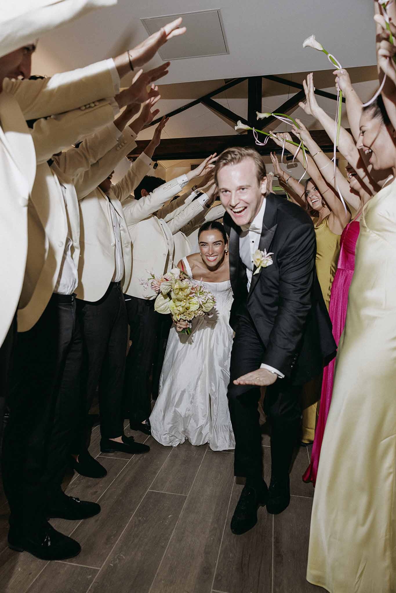 Couple walking through flower tunnel entrance at Domaine Rocabella, Cote d'Azur