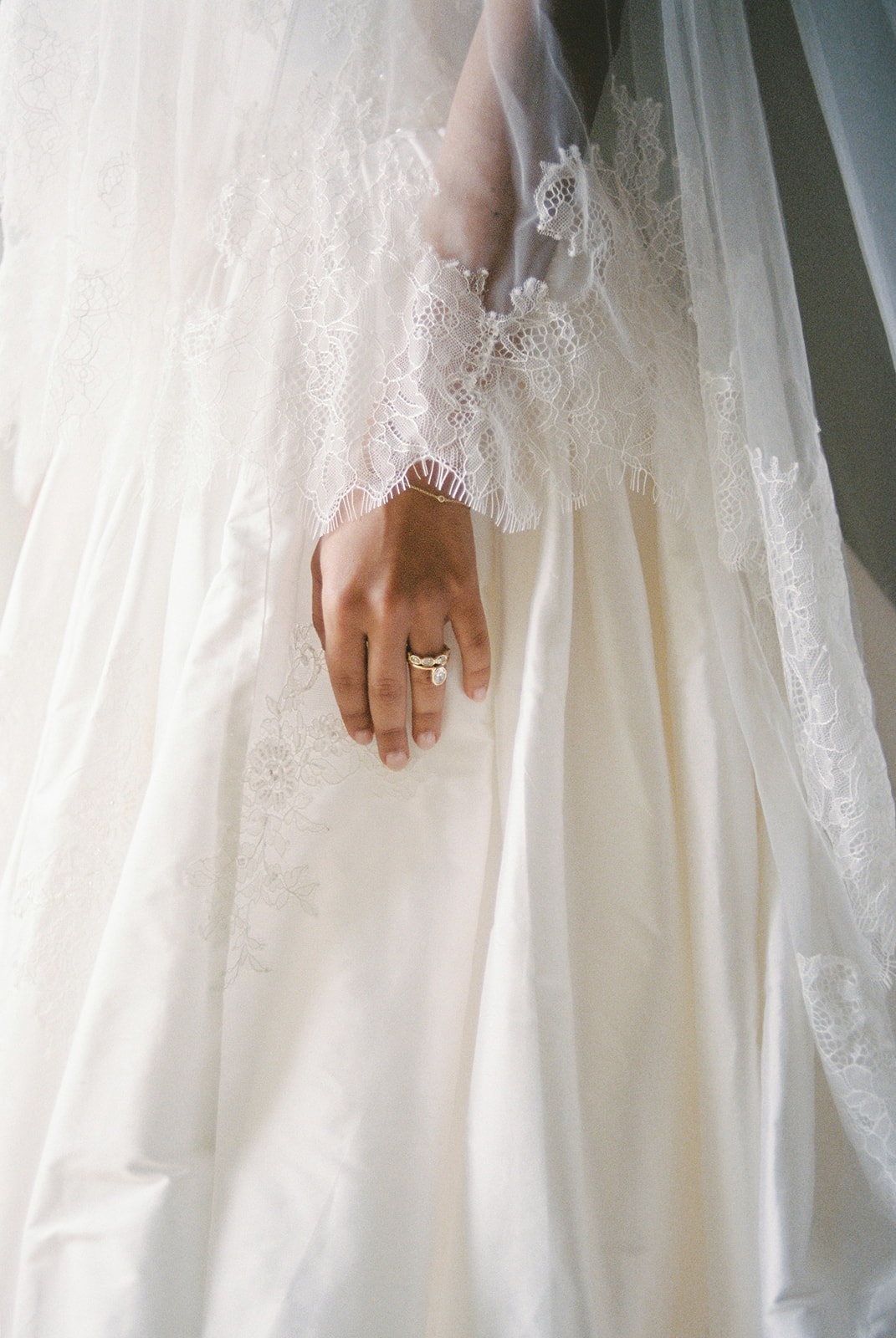 Engagement ring and lace gown detail at Domaine Rocabella