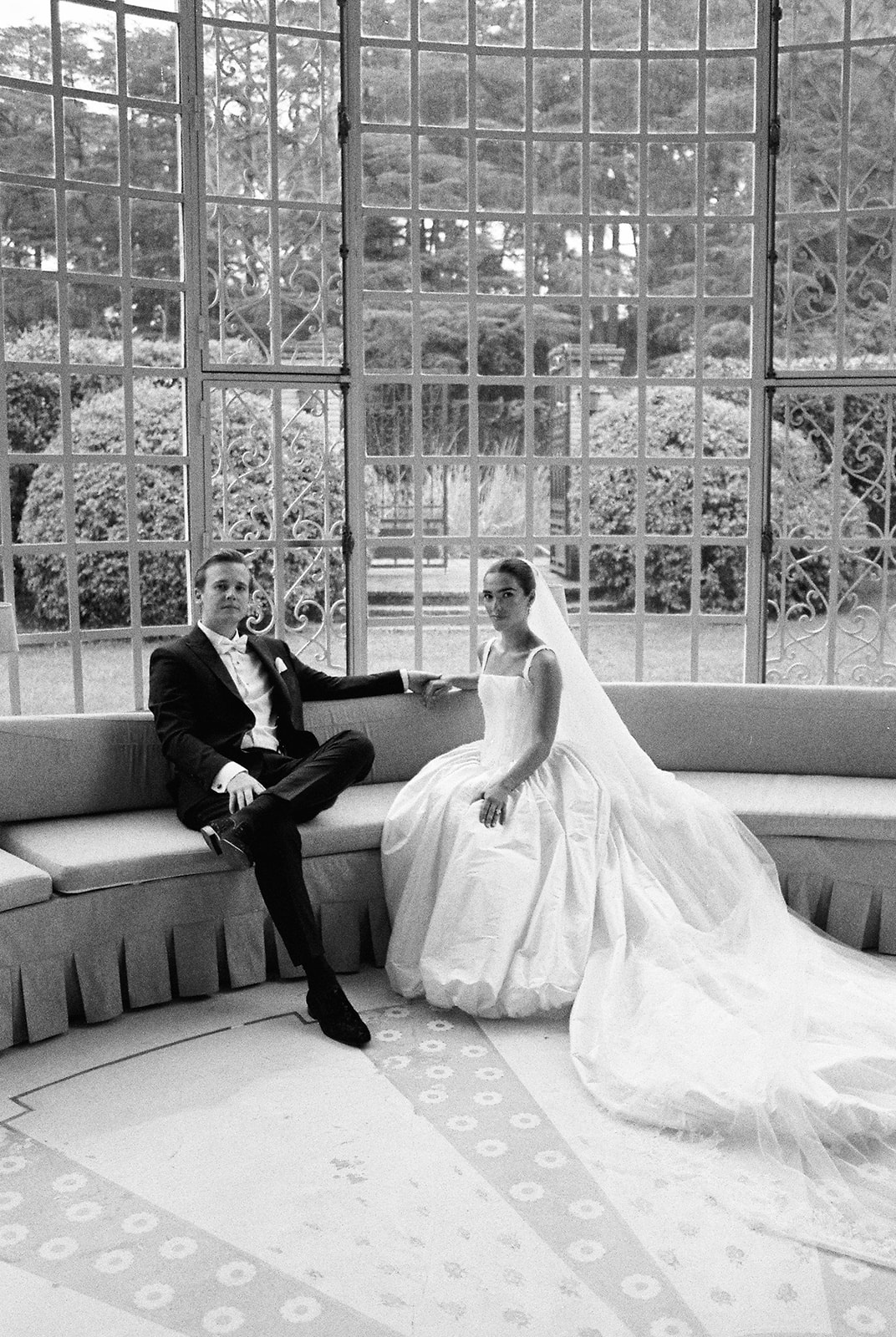 Couple on sofa in conservatory at Domaine Rocabella