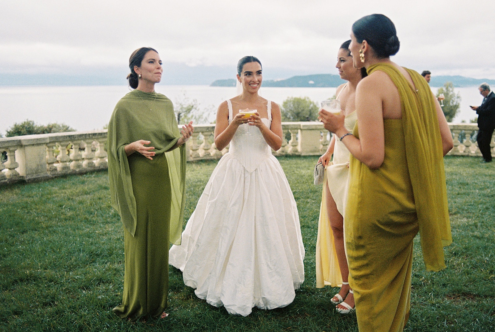 Bride with bridesmaids at cocktail hour at Domaine Rocabella
