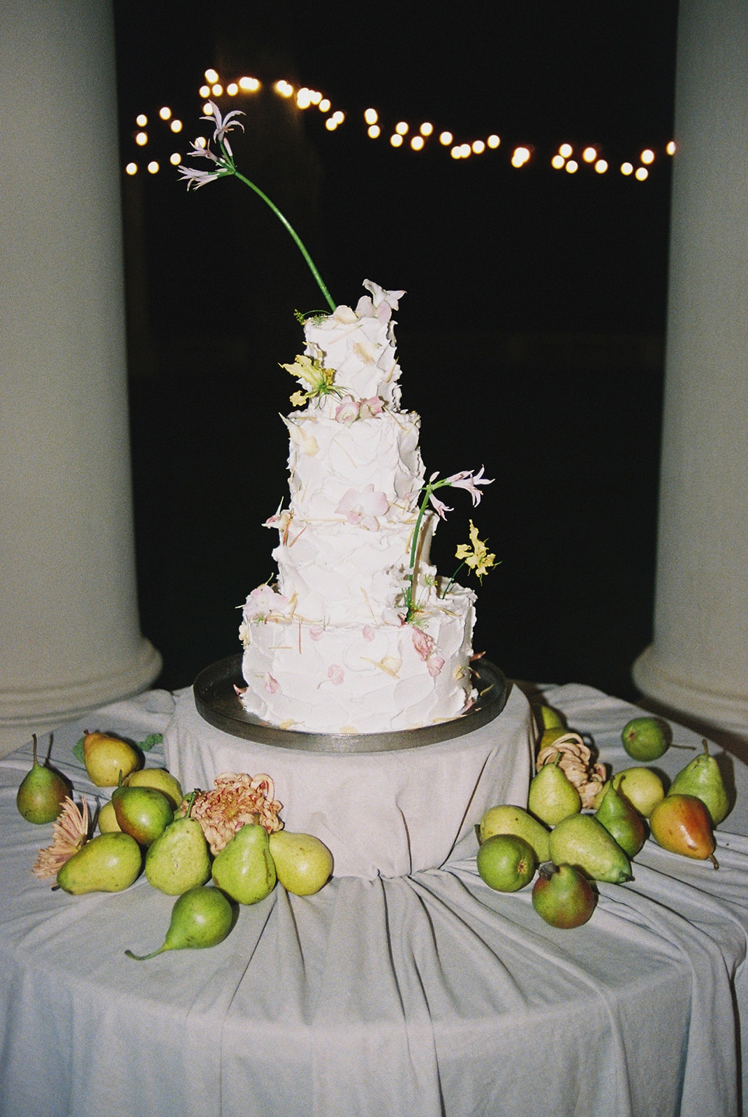 Ruffled wedding cake with fruit at Domaine Rocabella