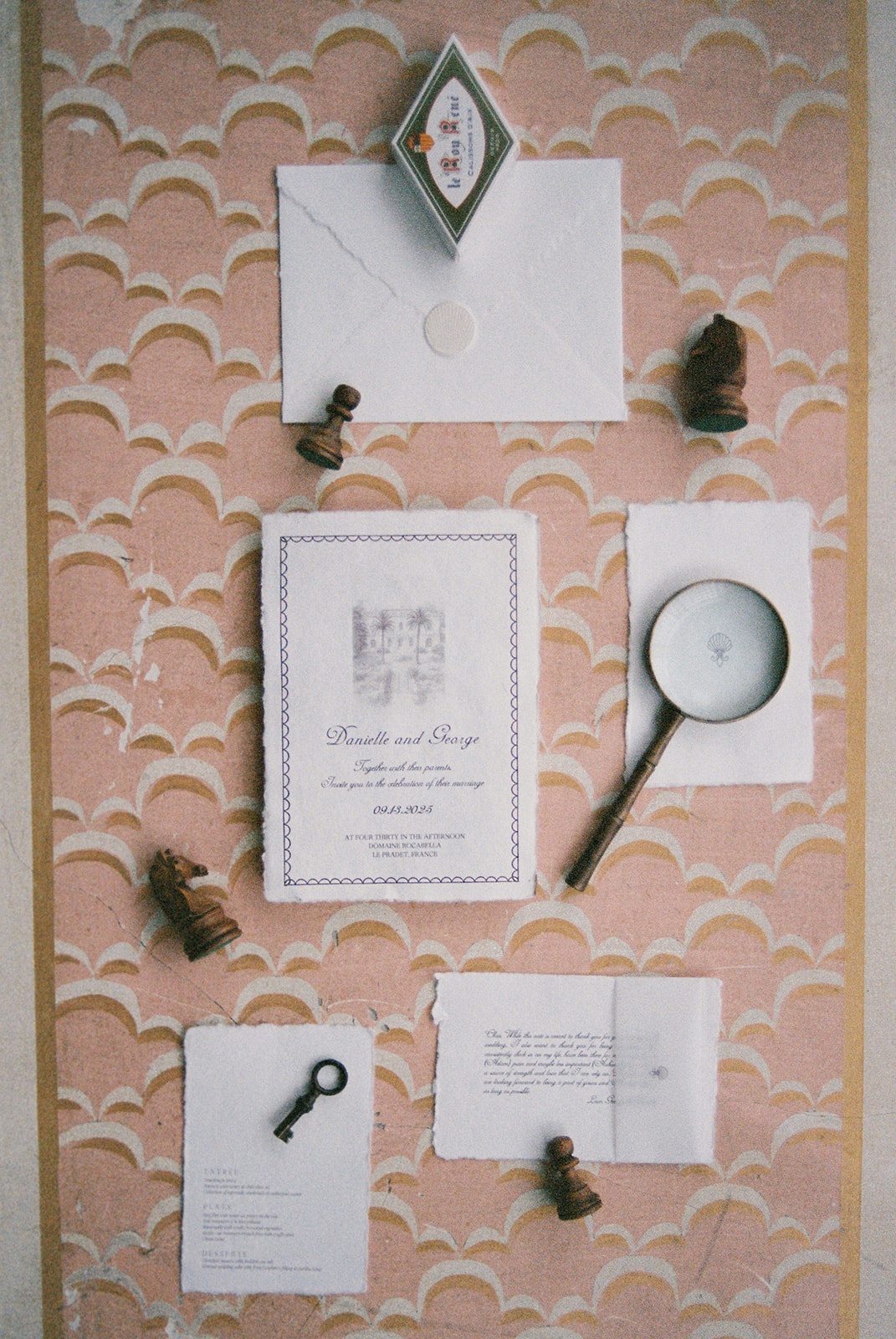 Stationery flat lay with vintage details at Domaine Rocabella