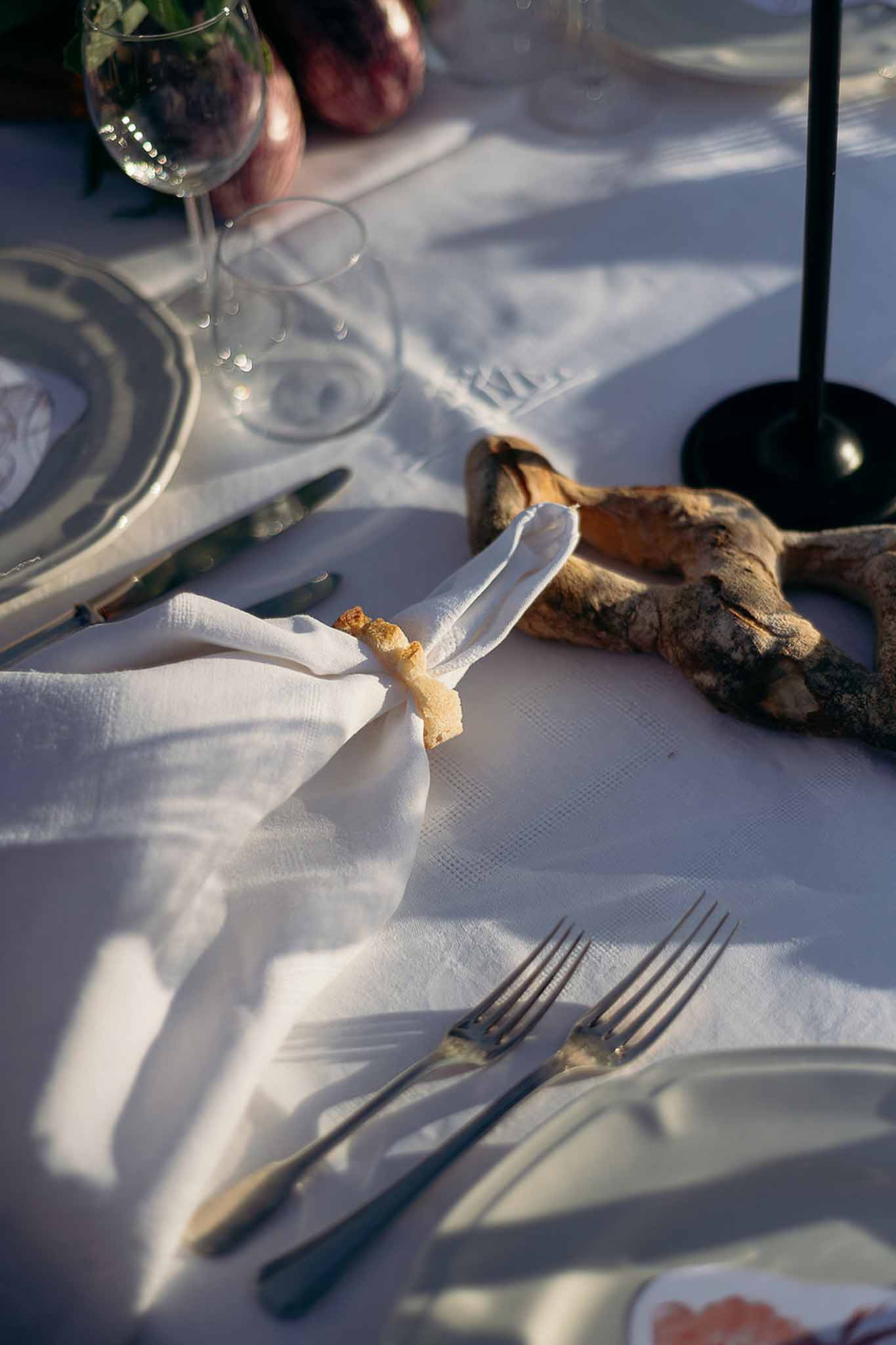 Linen napkin, stoneware glasses and silverware table setting at golden hour, Bastide des Barattes