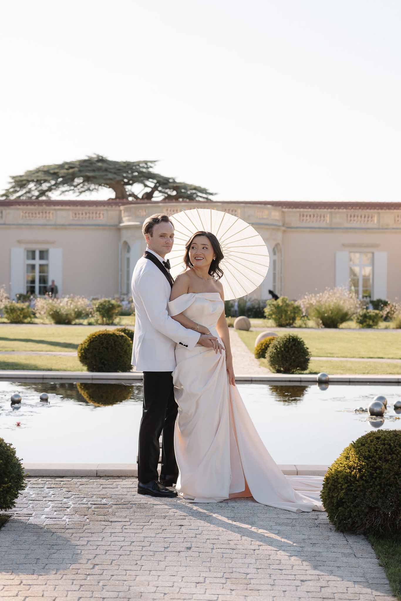Bride and groom portrait in a garden