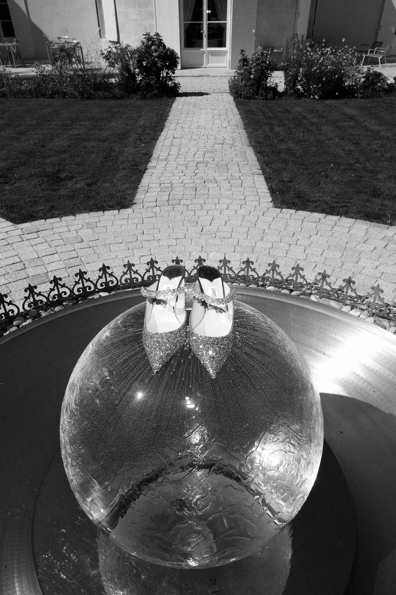 Black and white photo of wedding rings