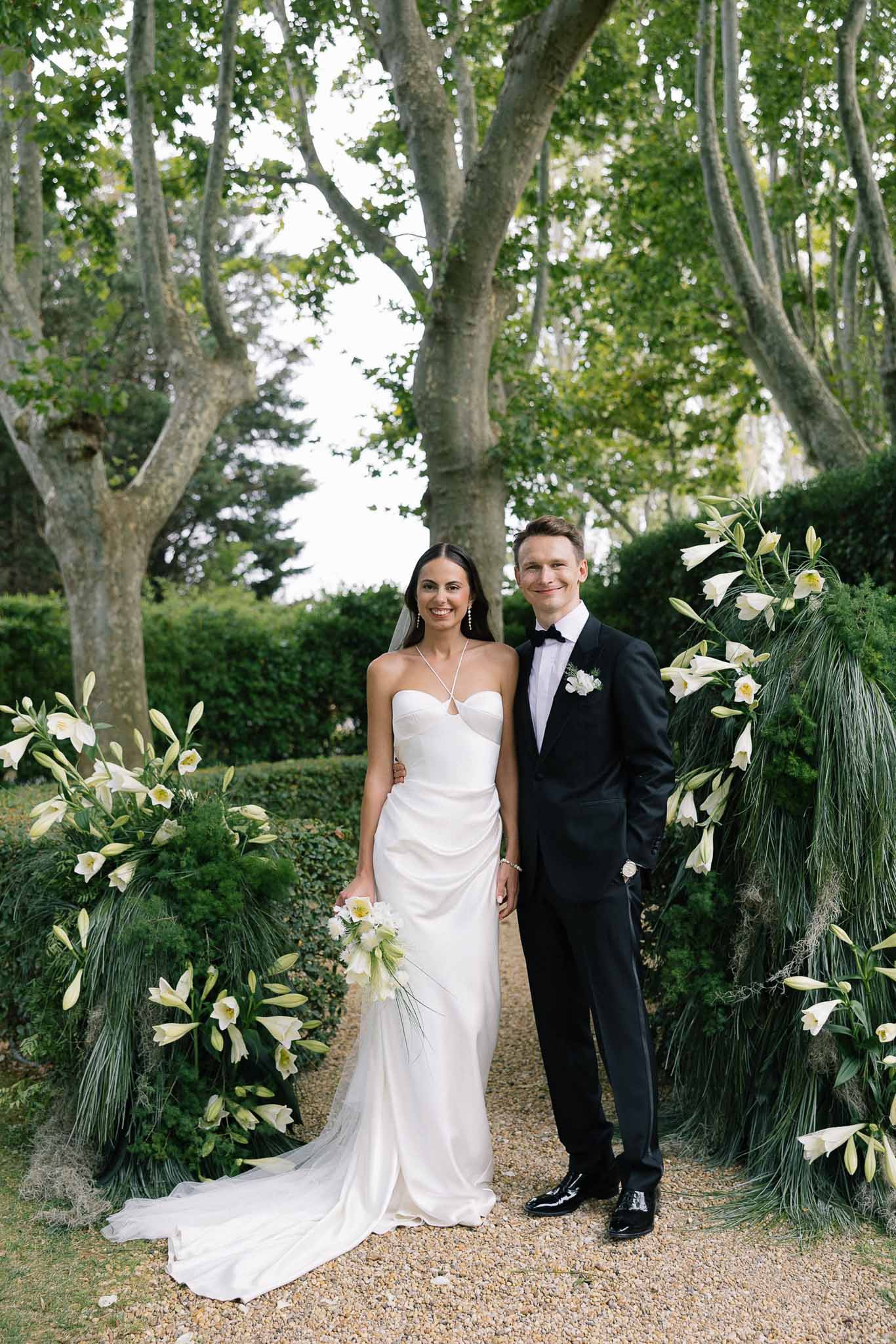 Bride and groom portrait in a garden