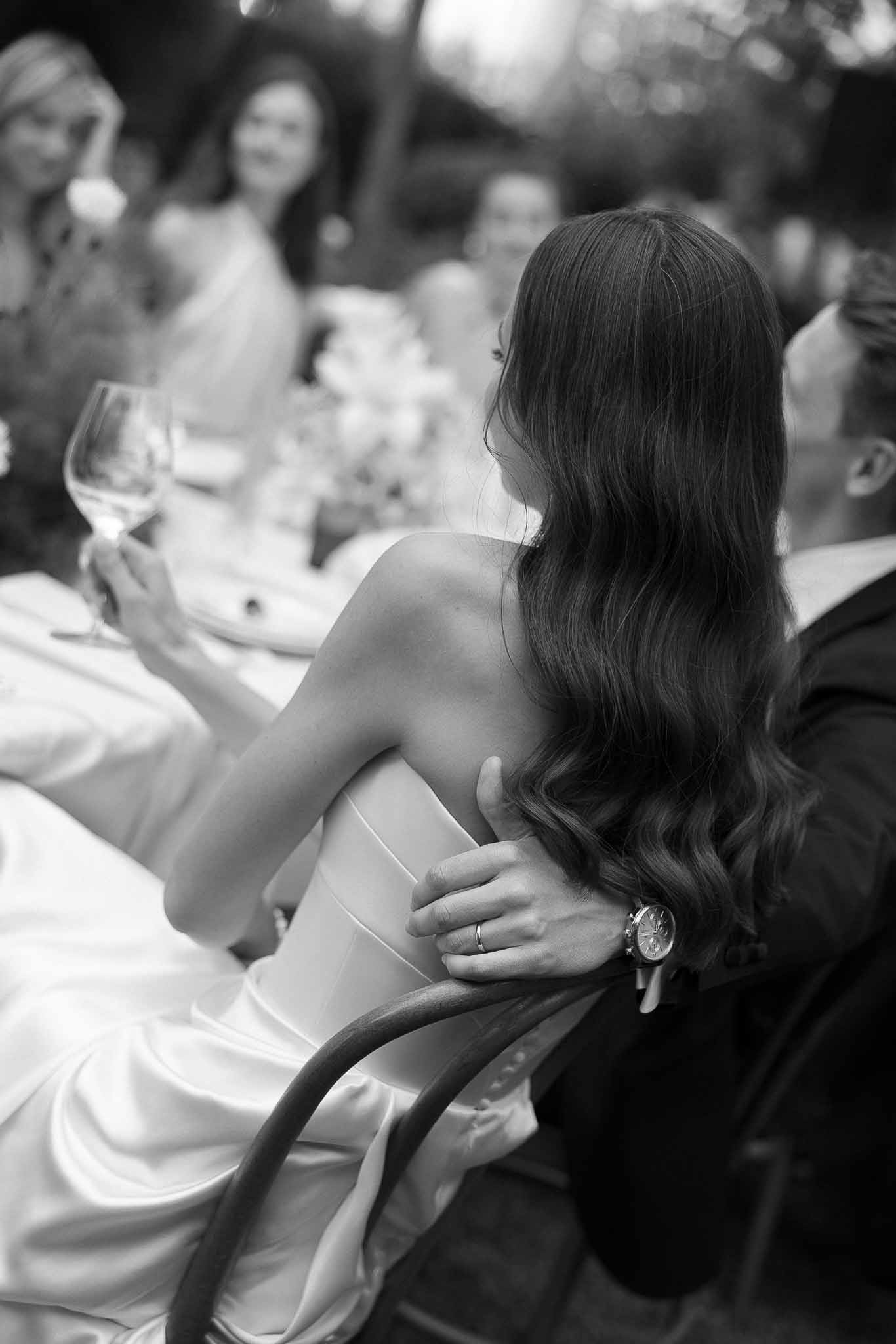Black and white photo of wedding reception table setting