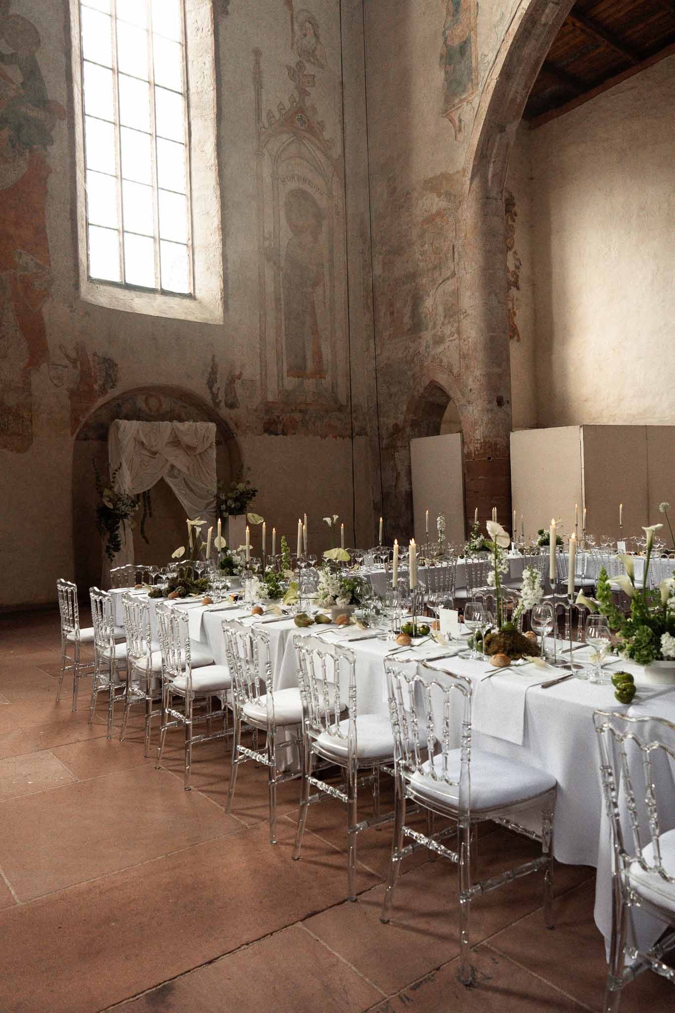 Wedding reception table setting in a chapel