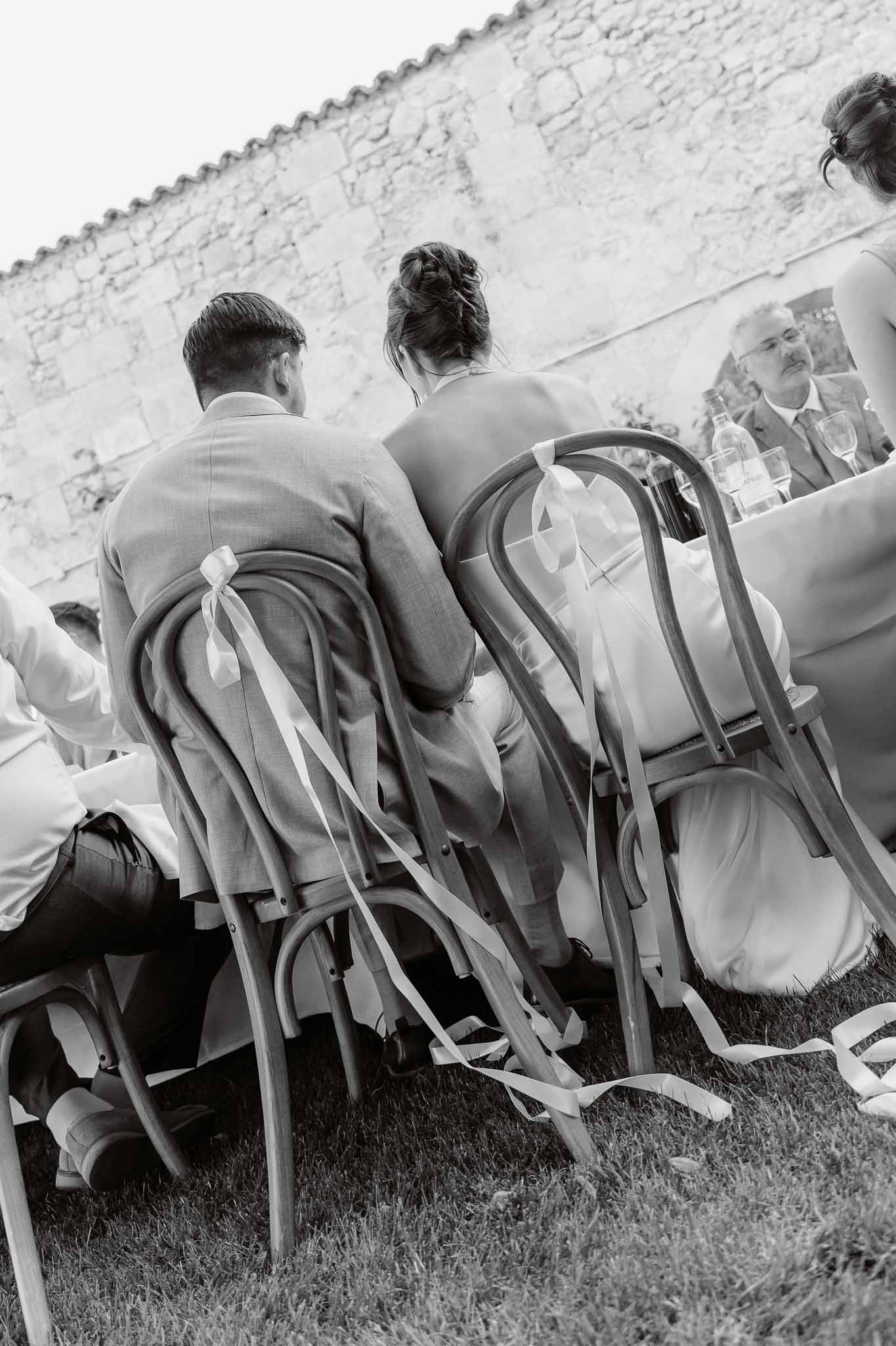 Black and white photo of wedding reception table setting
