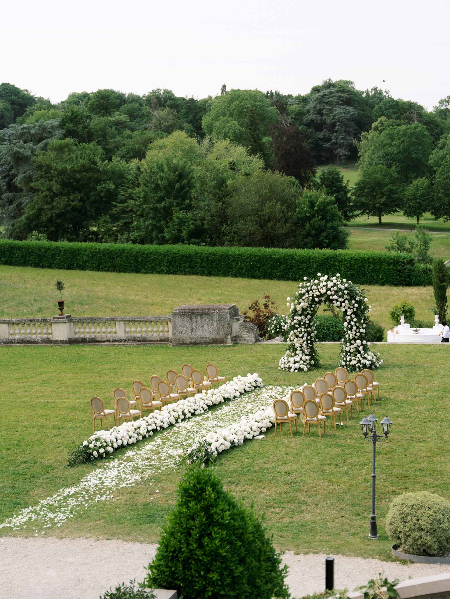 Wedding ceremony setup with white roses