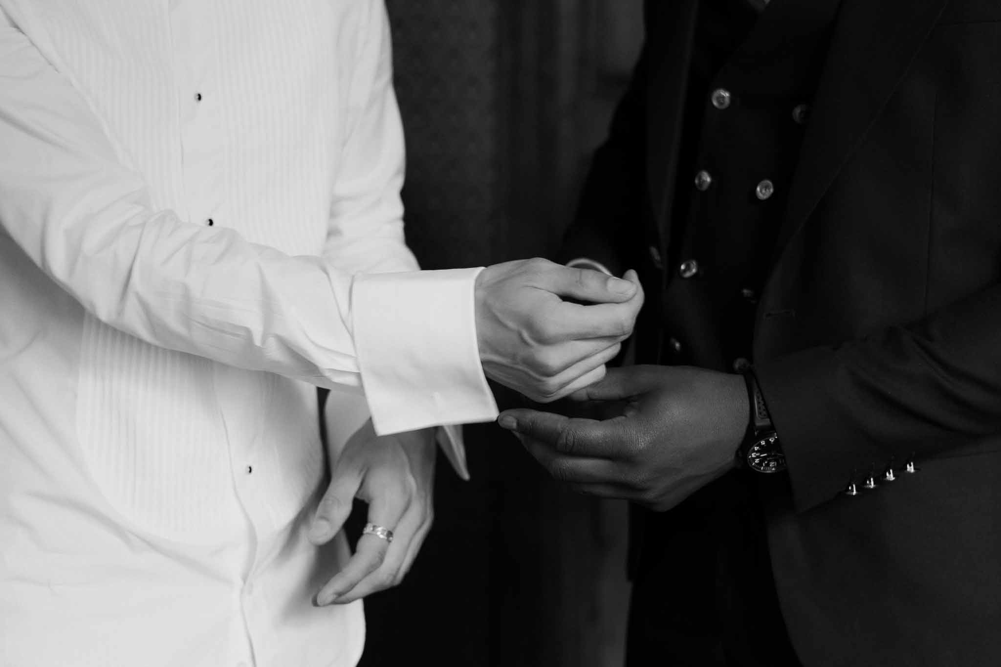 Black and white photo of wedding rings