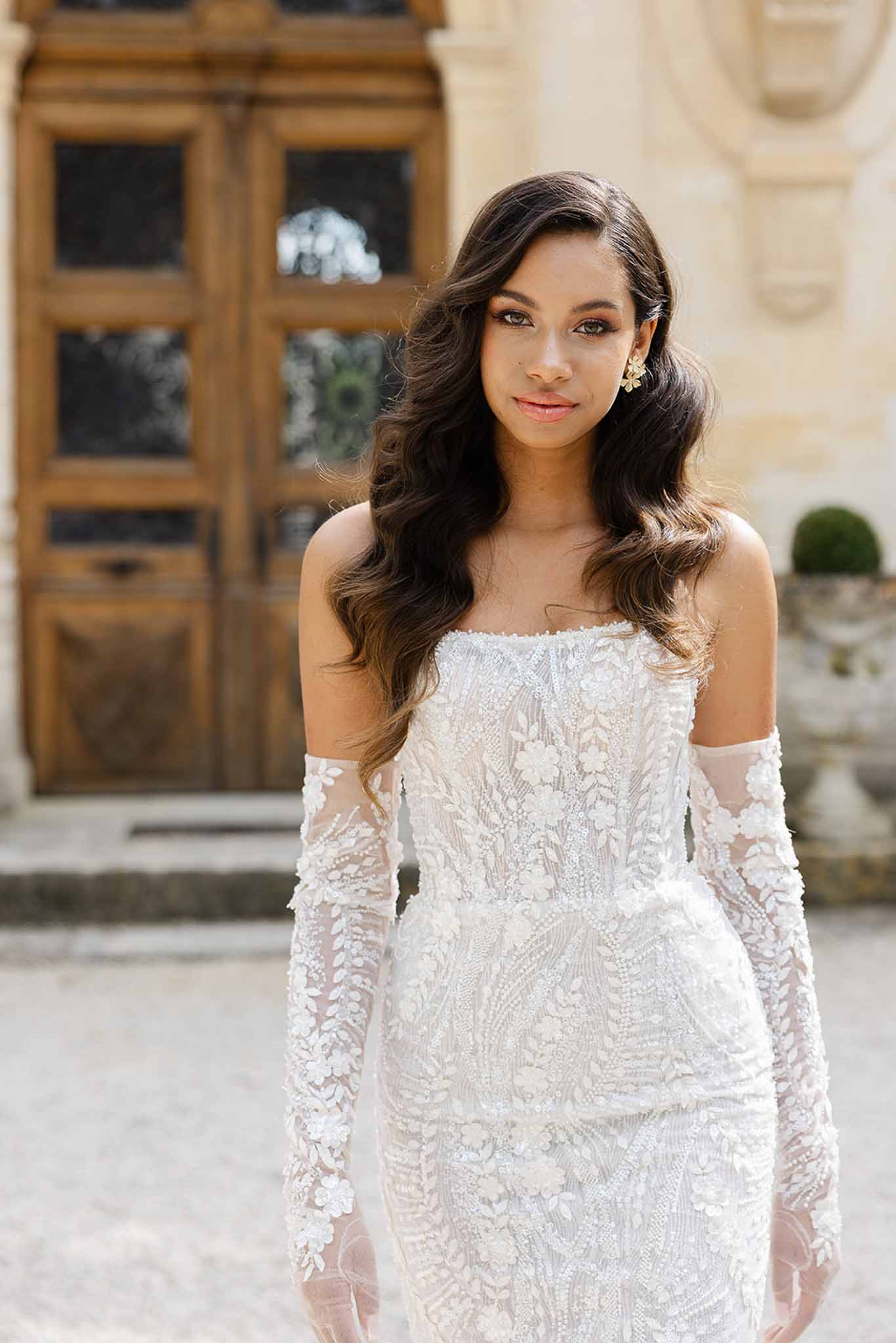 Bride in strapless lace mermaid gown with gloves at Château Martinay, Provence