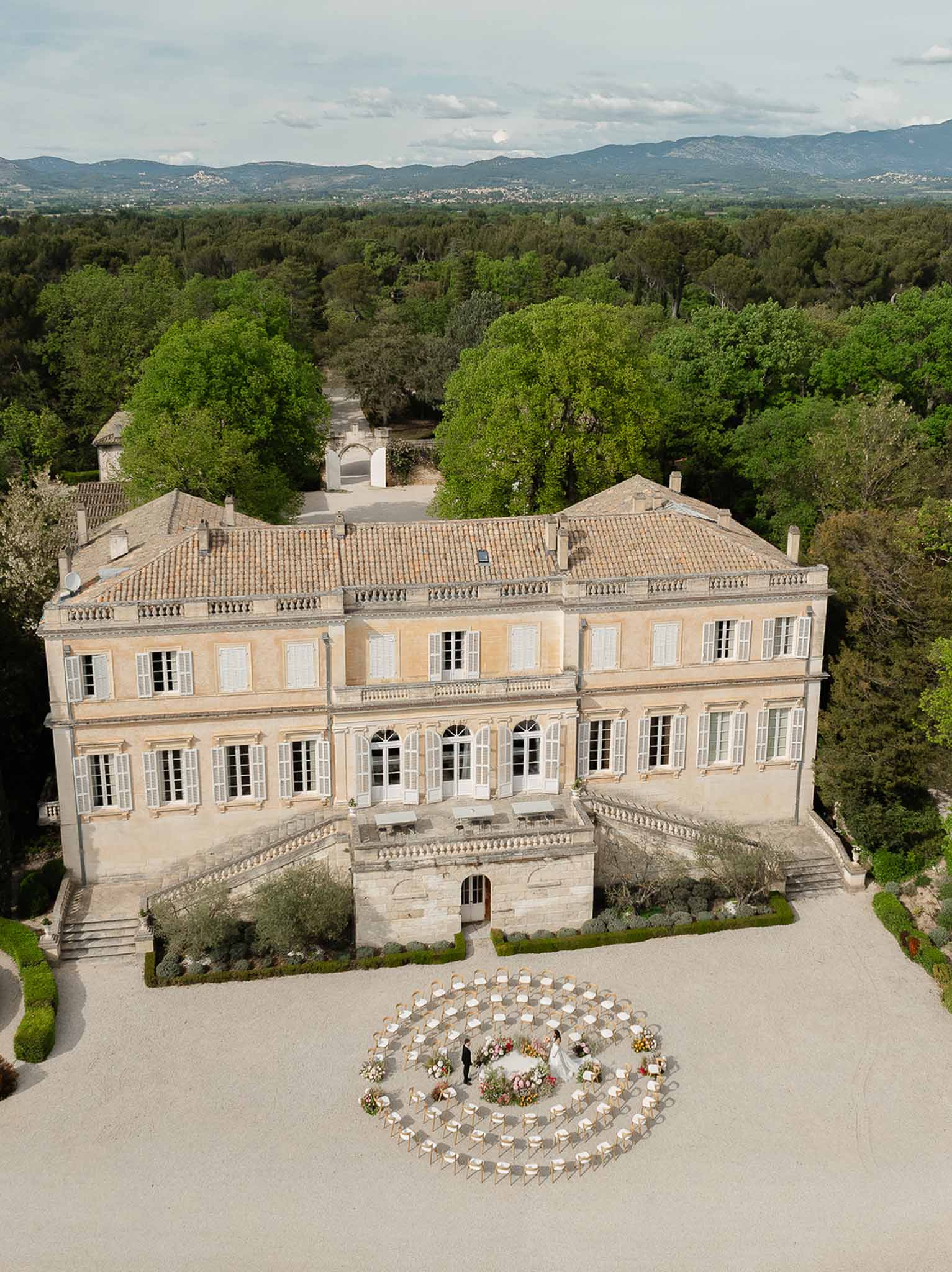 Aerial view of circular ceremony seating arrangement at Château Martinay