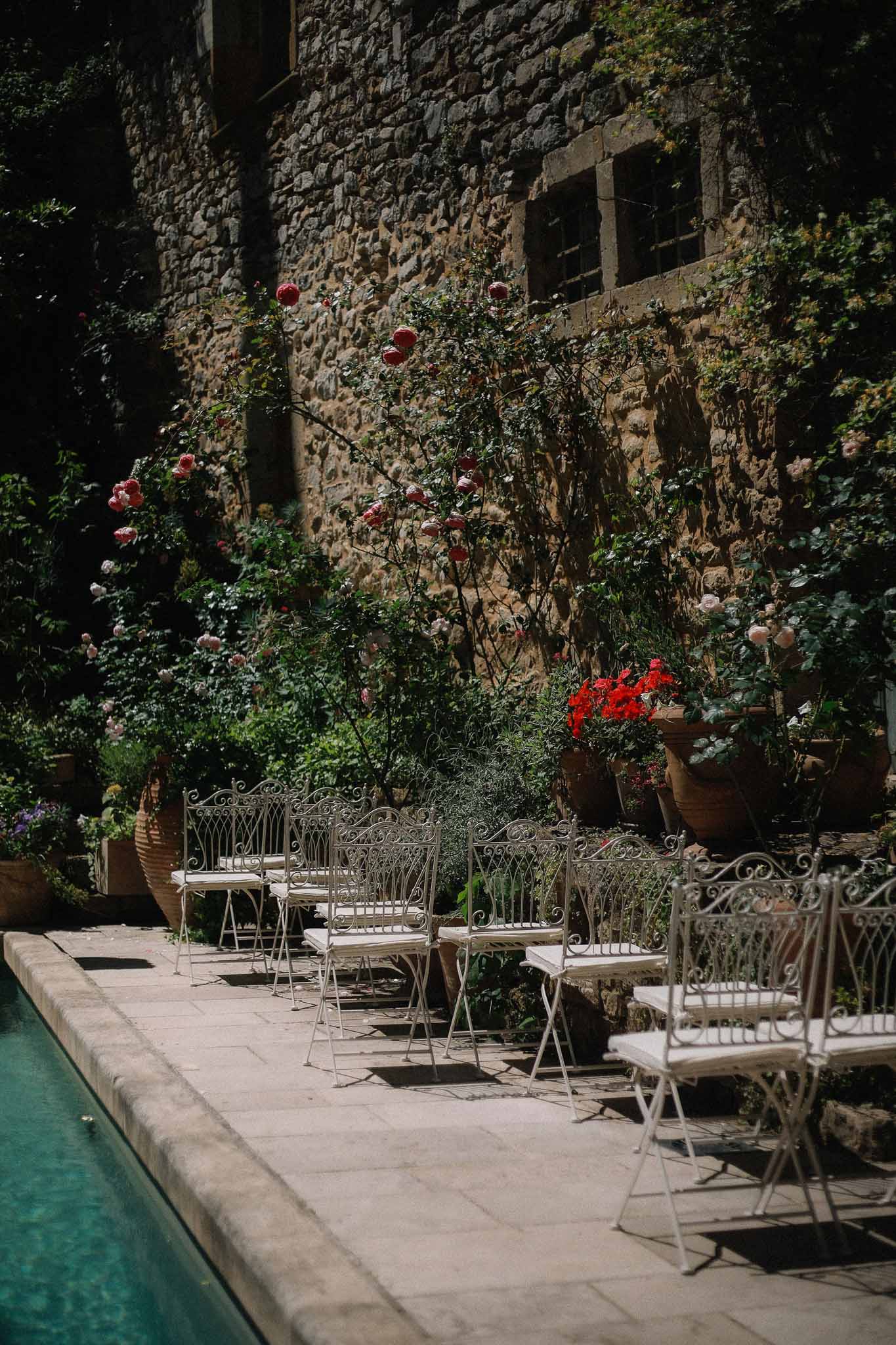 Poolside ceremony seating at Chateau St Victor Lacoste