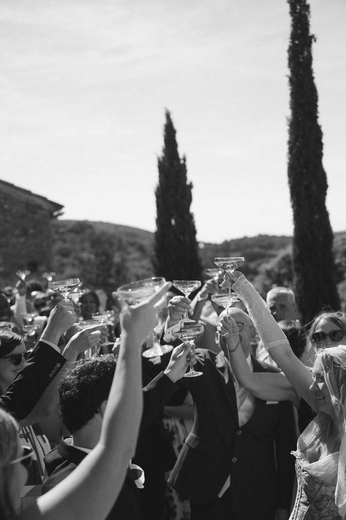 Champagne toast among guests at Chateau St Victor Lacoste reception