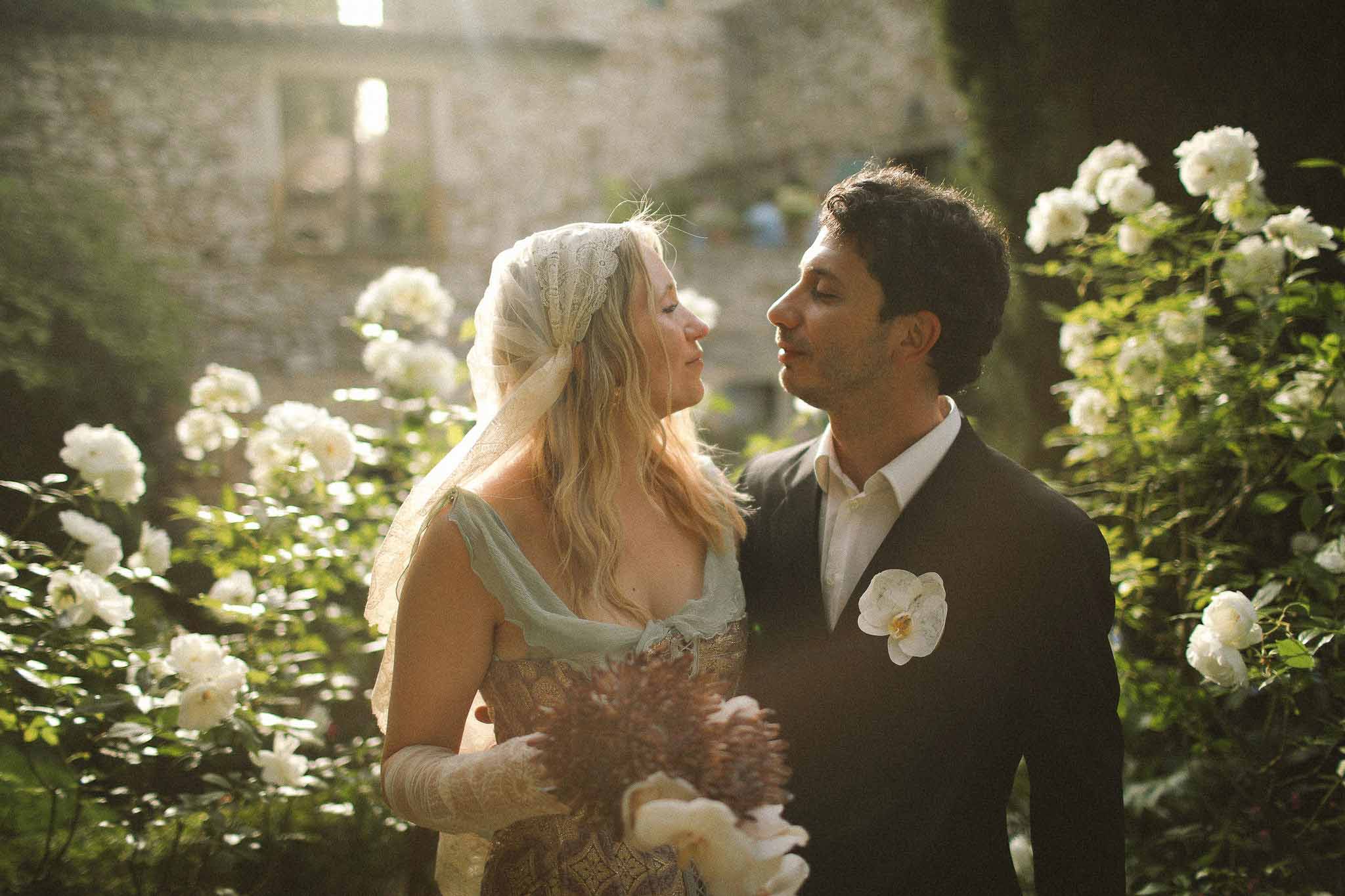 Couple gazing at each other at golden hour at Chateau St Victor Lacoste