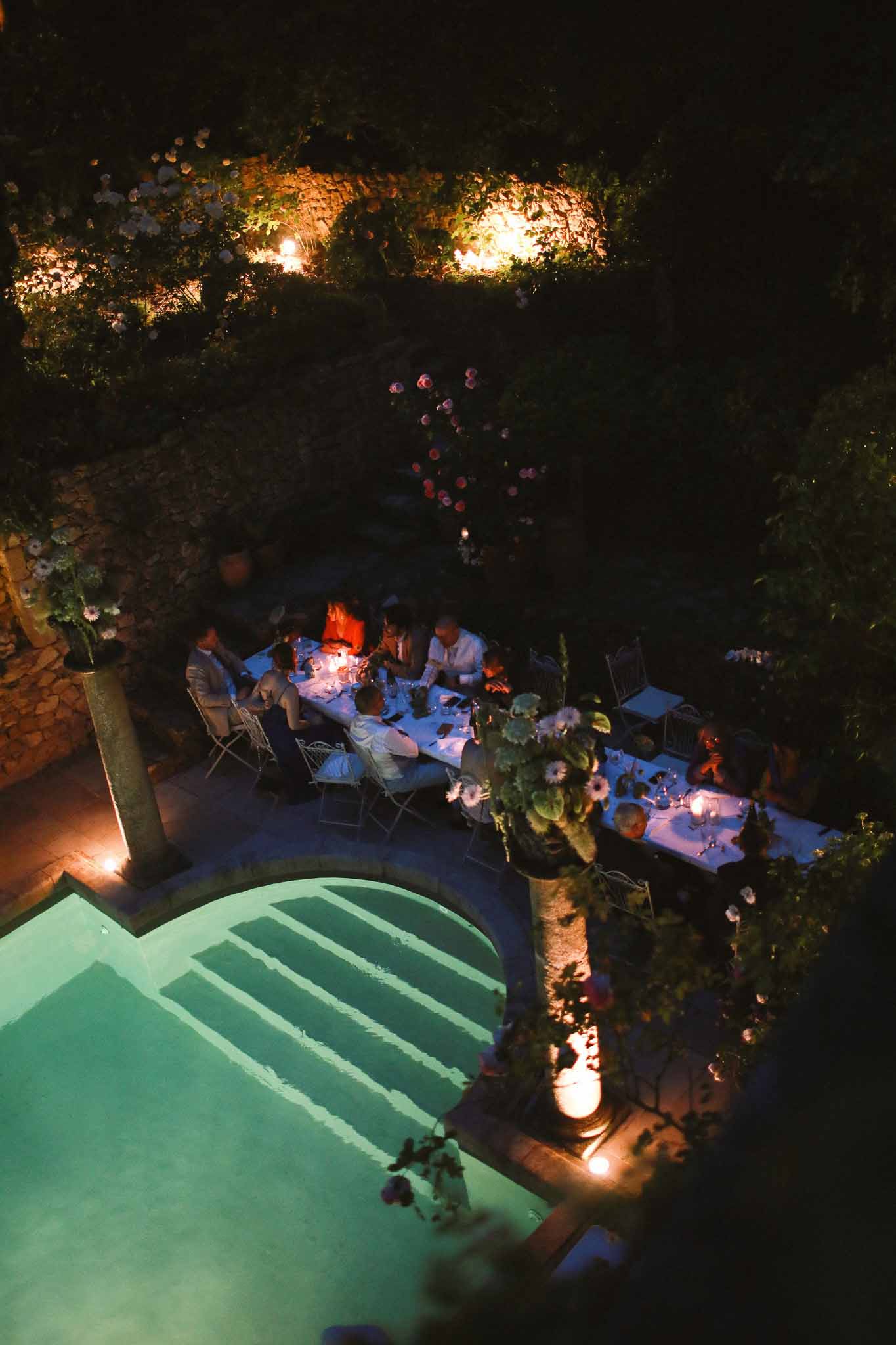 Guests dining at night at Chateau St Victor Lacoste reception