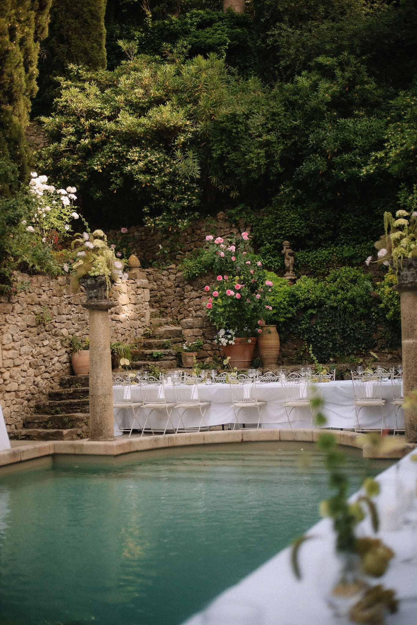 Reception dining area by the pool at Chateau St Victor Lacoste