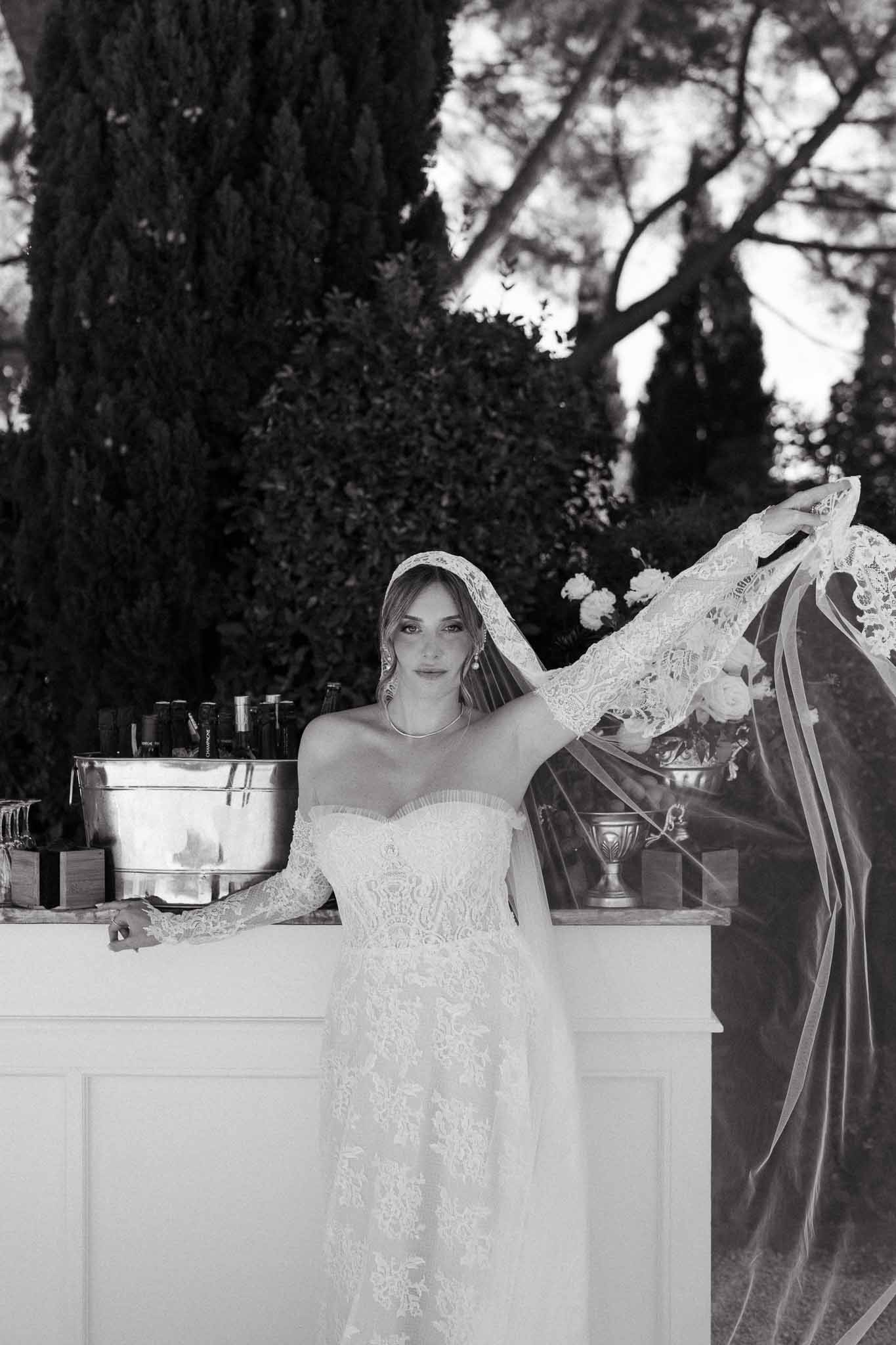 Black and white photo of wedding cocktail hour in a chapel