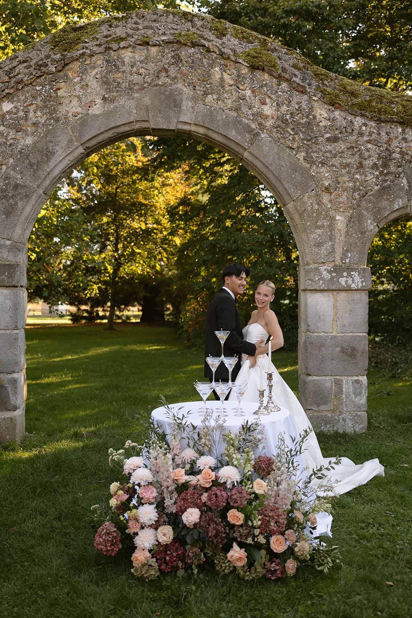 Wedding reception table setting with white roses