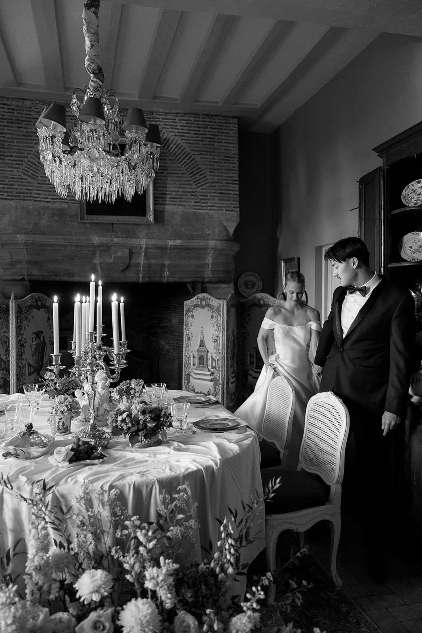 Black and white photo of wedding reception table setting