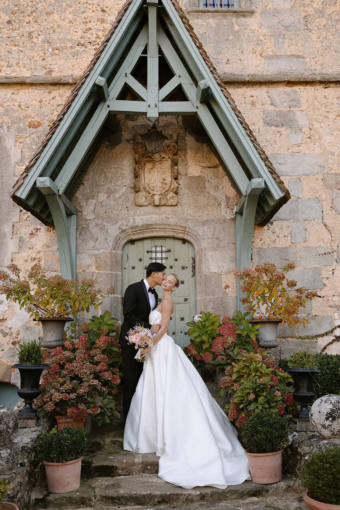 Bride and groom kissing