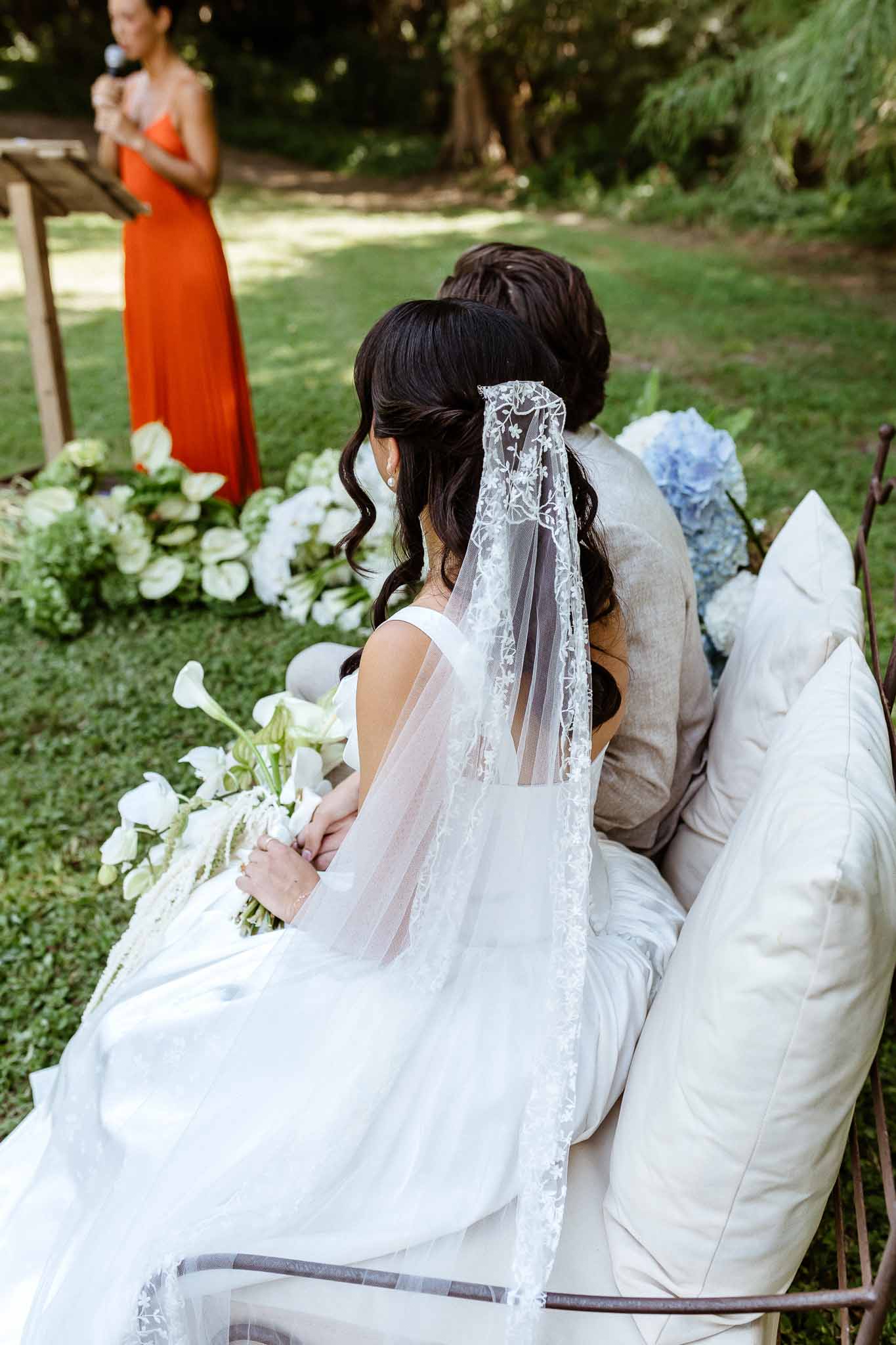Wedding ceremony in a garden with hydrangeas