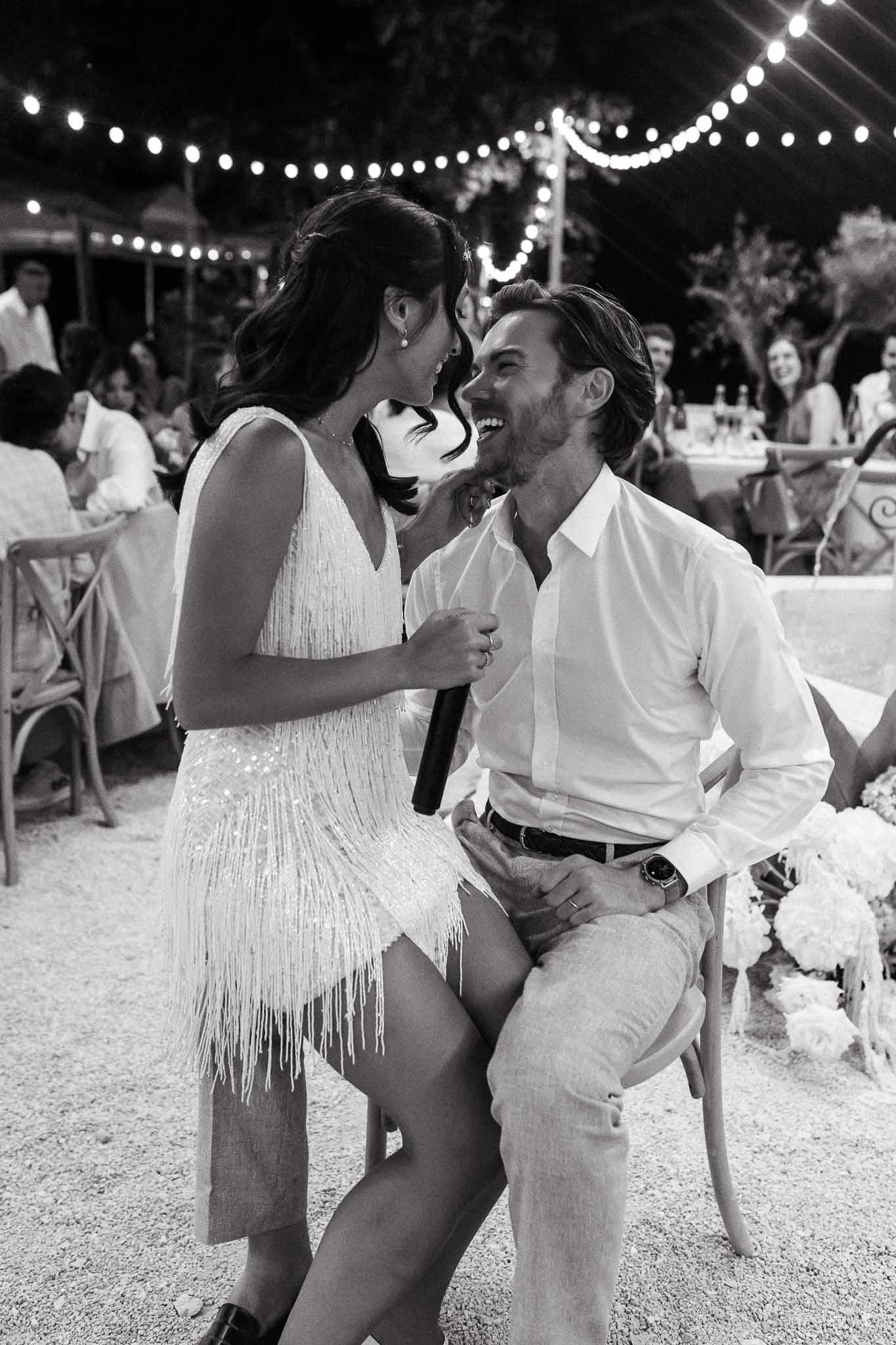 Black and white photo of wedding reception table setting