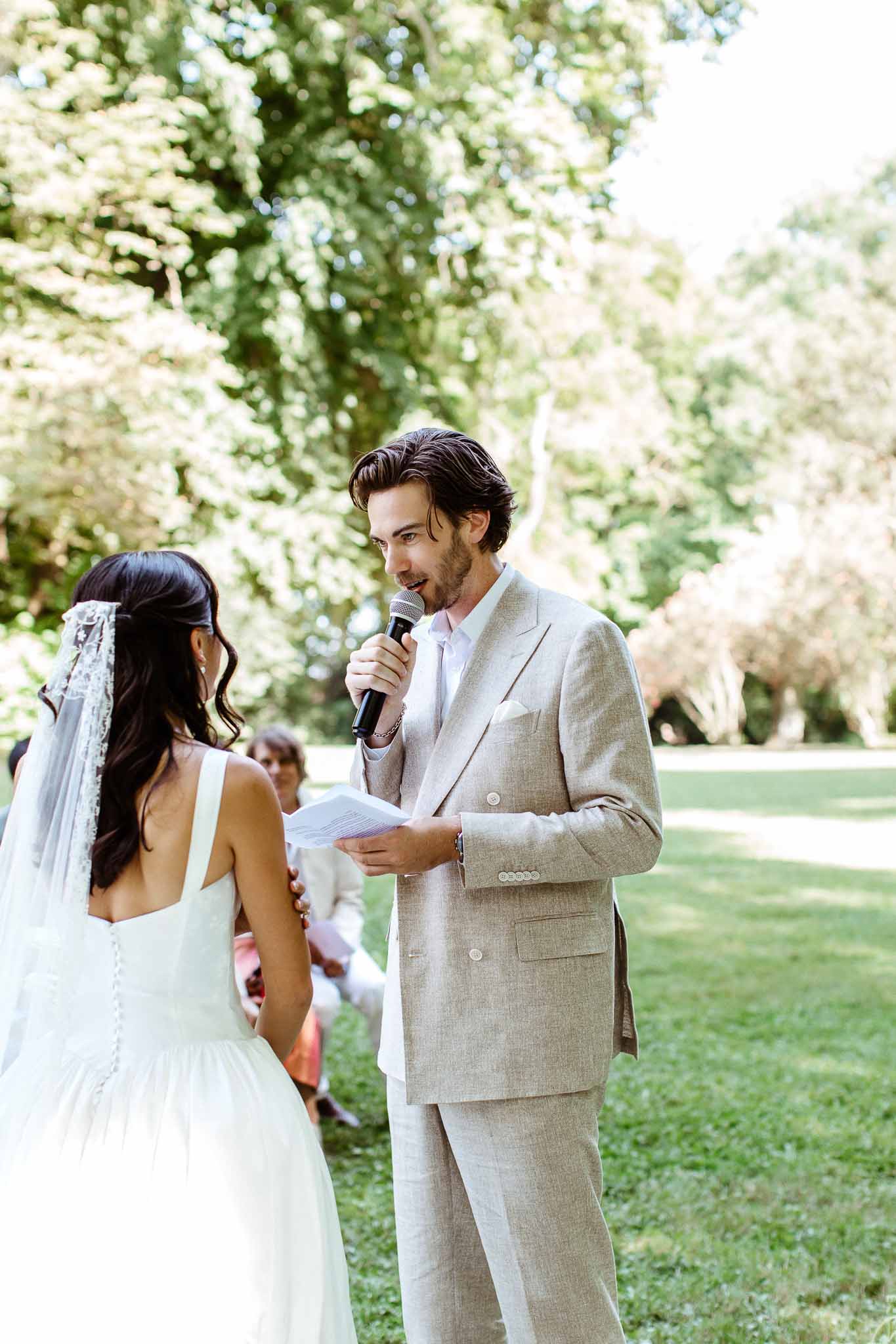 Couple exchanging vows in a garden