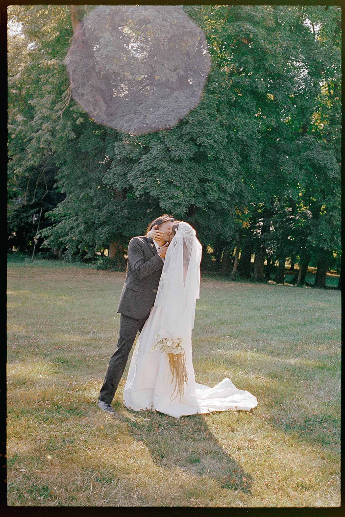 Bride and groom kissing
