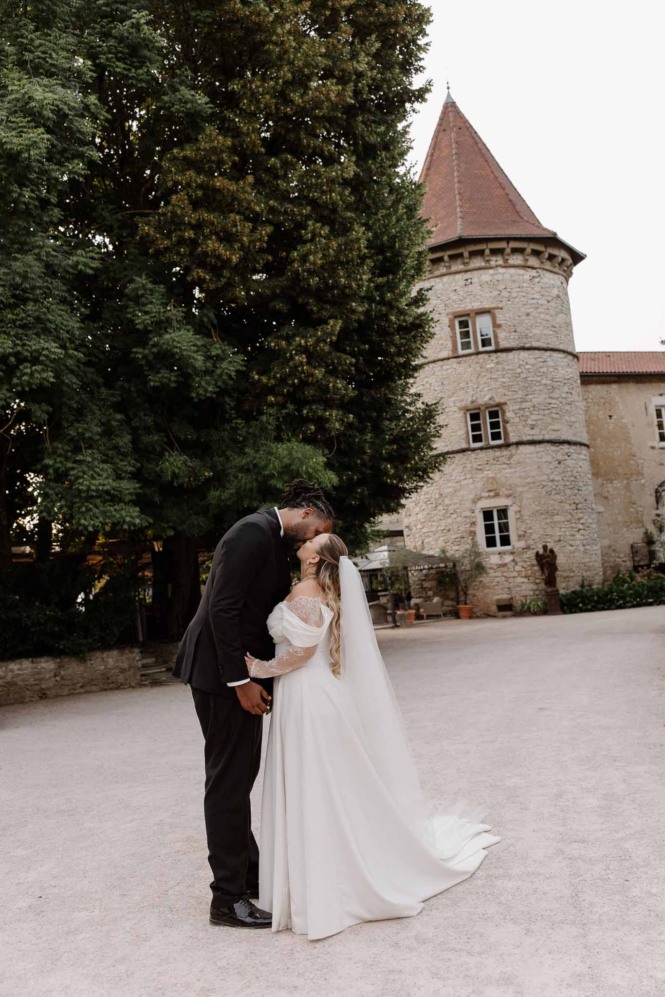 Bride and groom kissing
