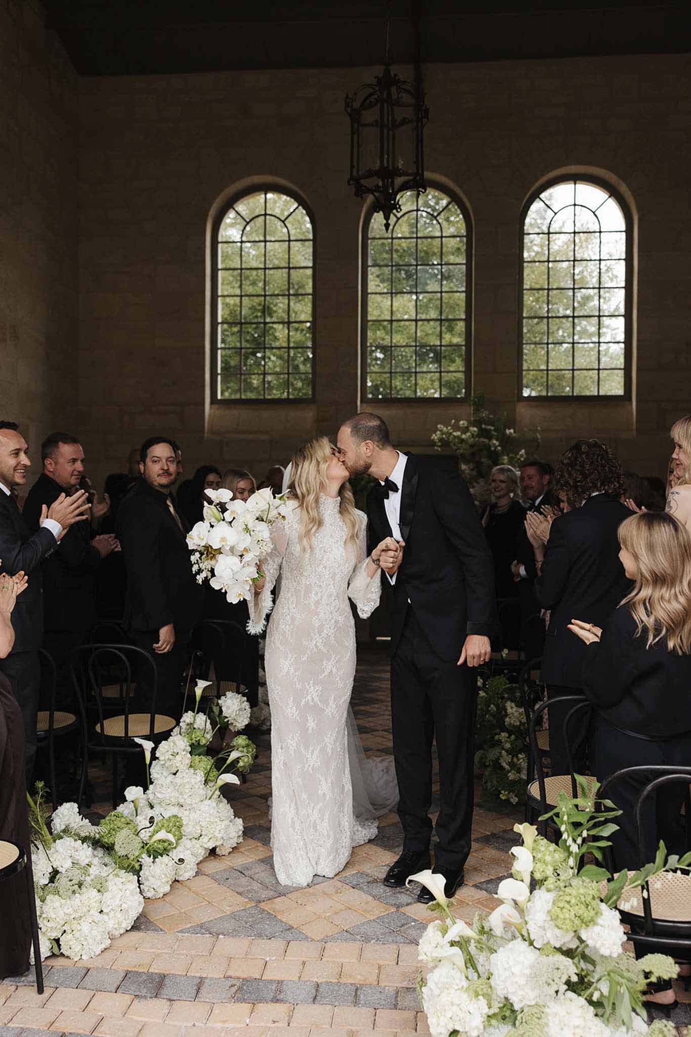 Wedding ceremony in a chapel with hydrangeas