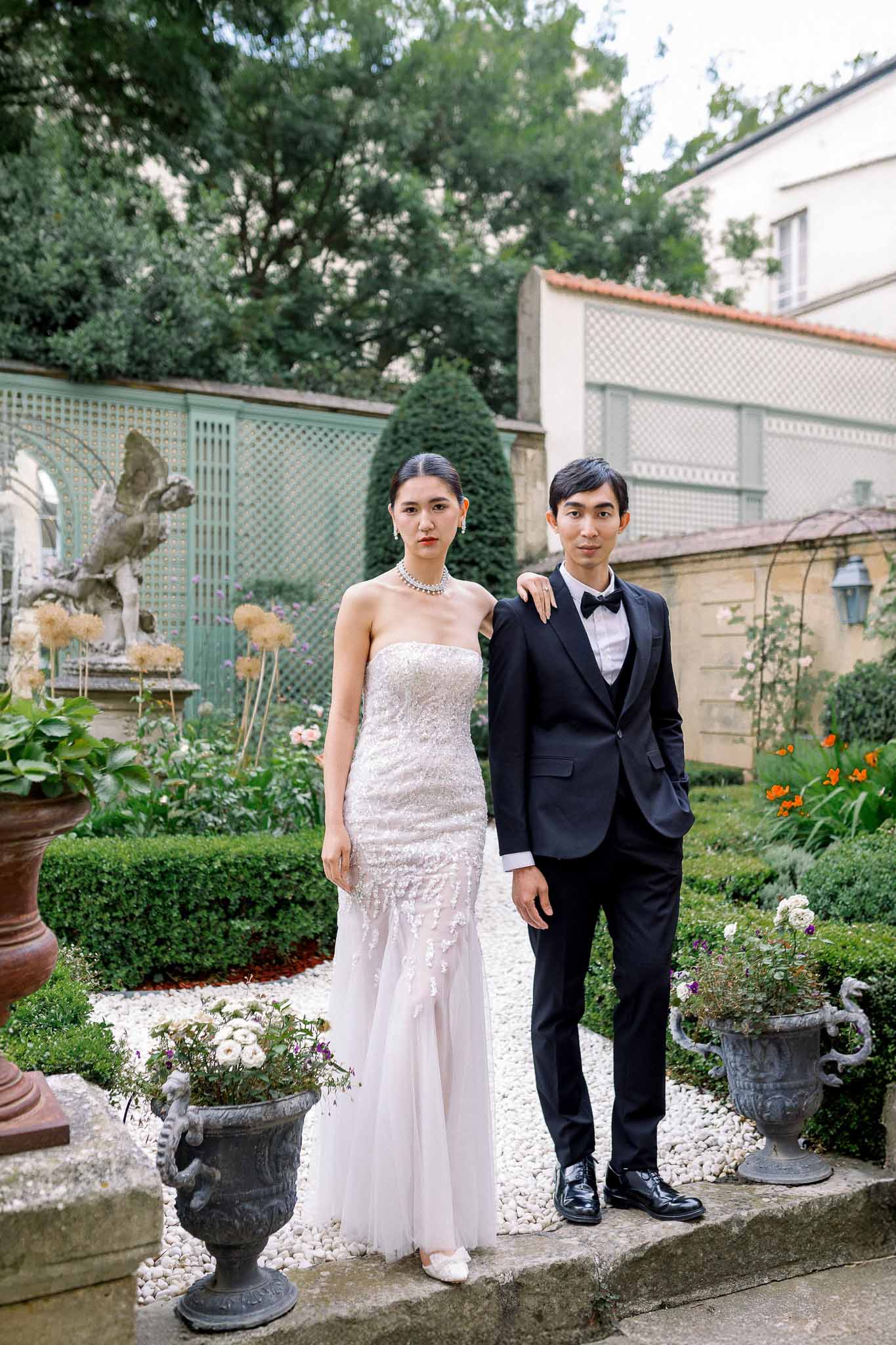 Bride and groom portrait in a garden