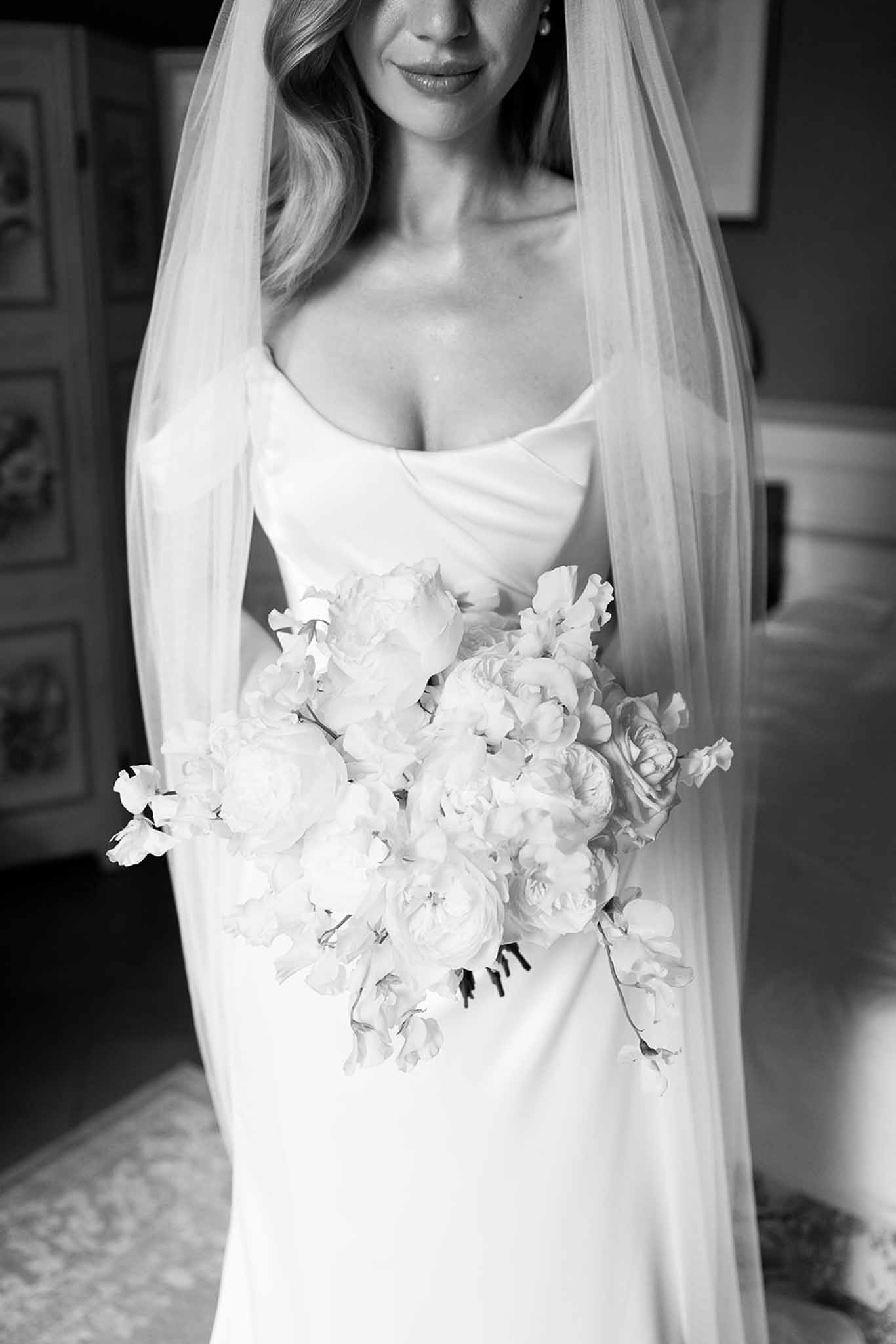 Black and white photo of bridal portrait in a garden