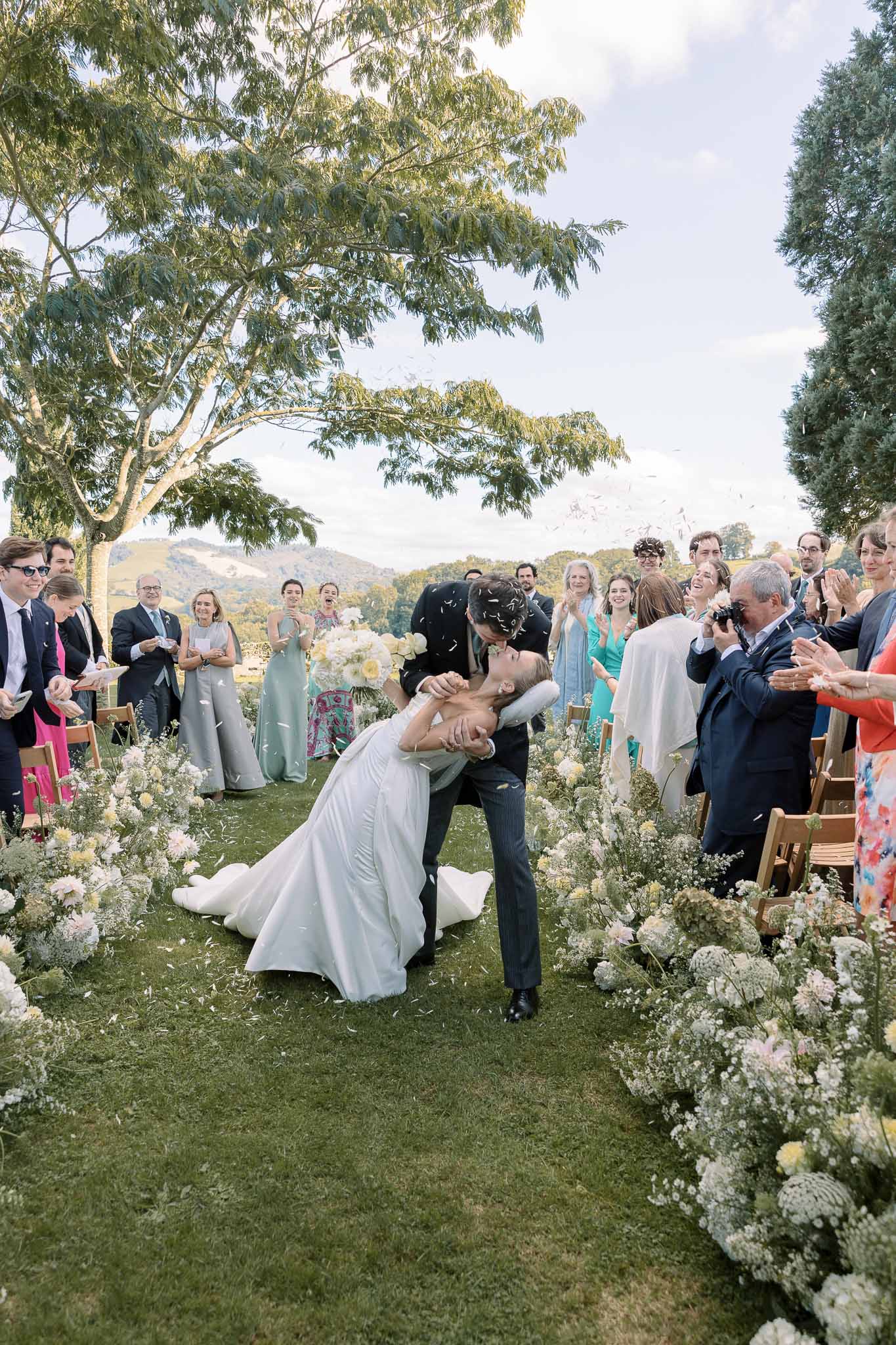 Wedding ceremony in a garden with white roses