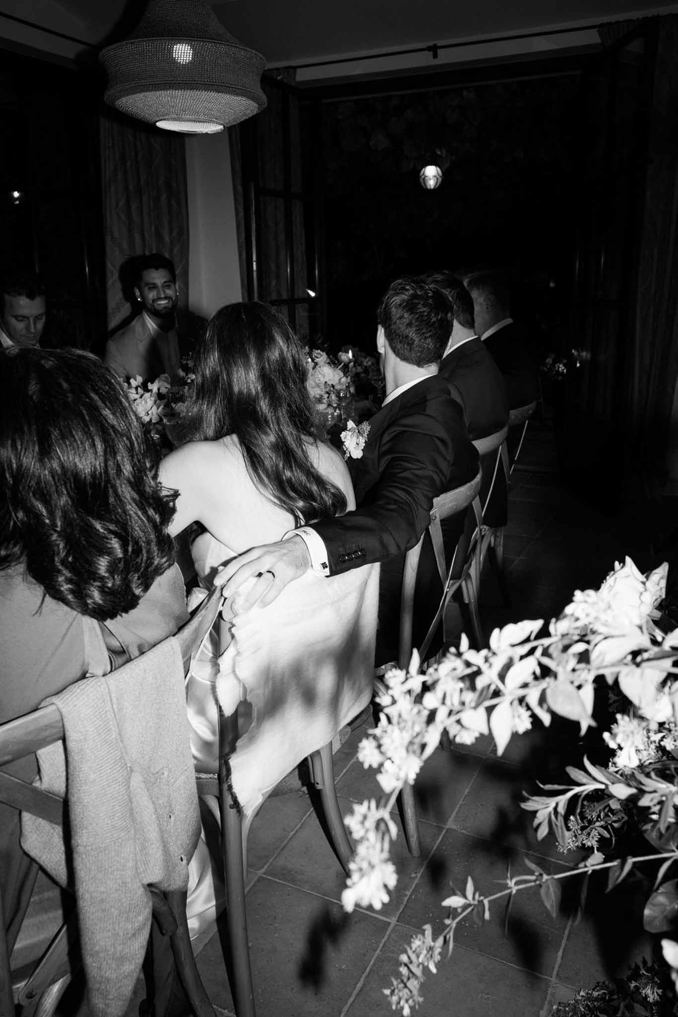 Black and white photo of wedding reception speech
