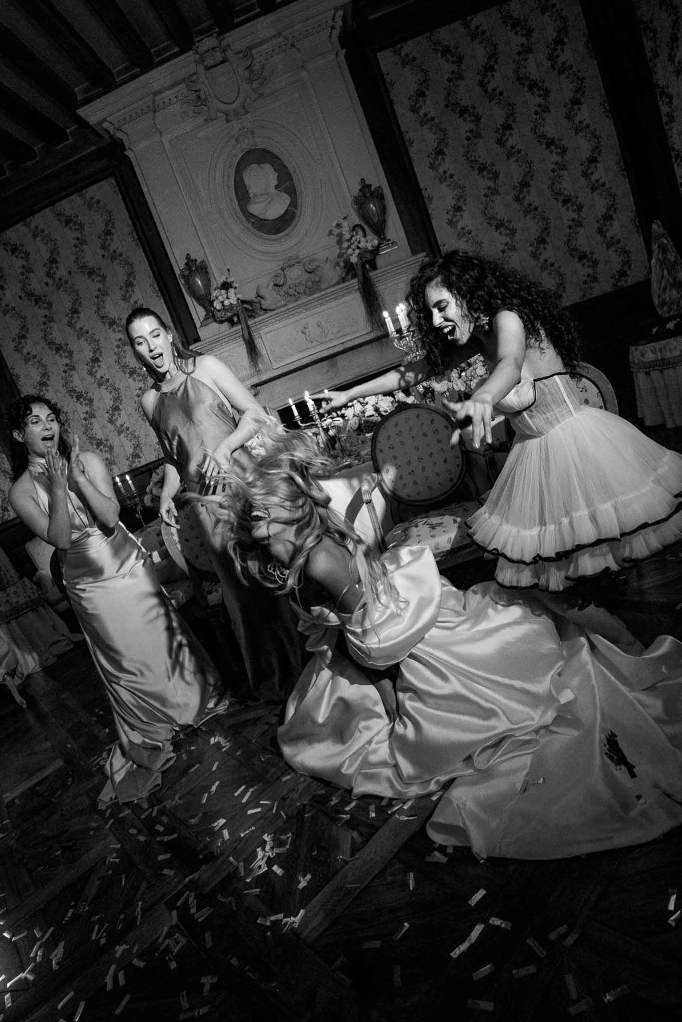 Black and white photo of wedding reception table setting