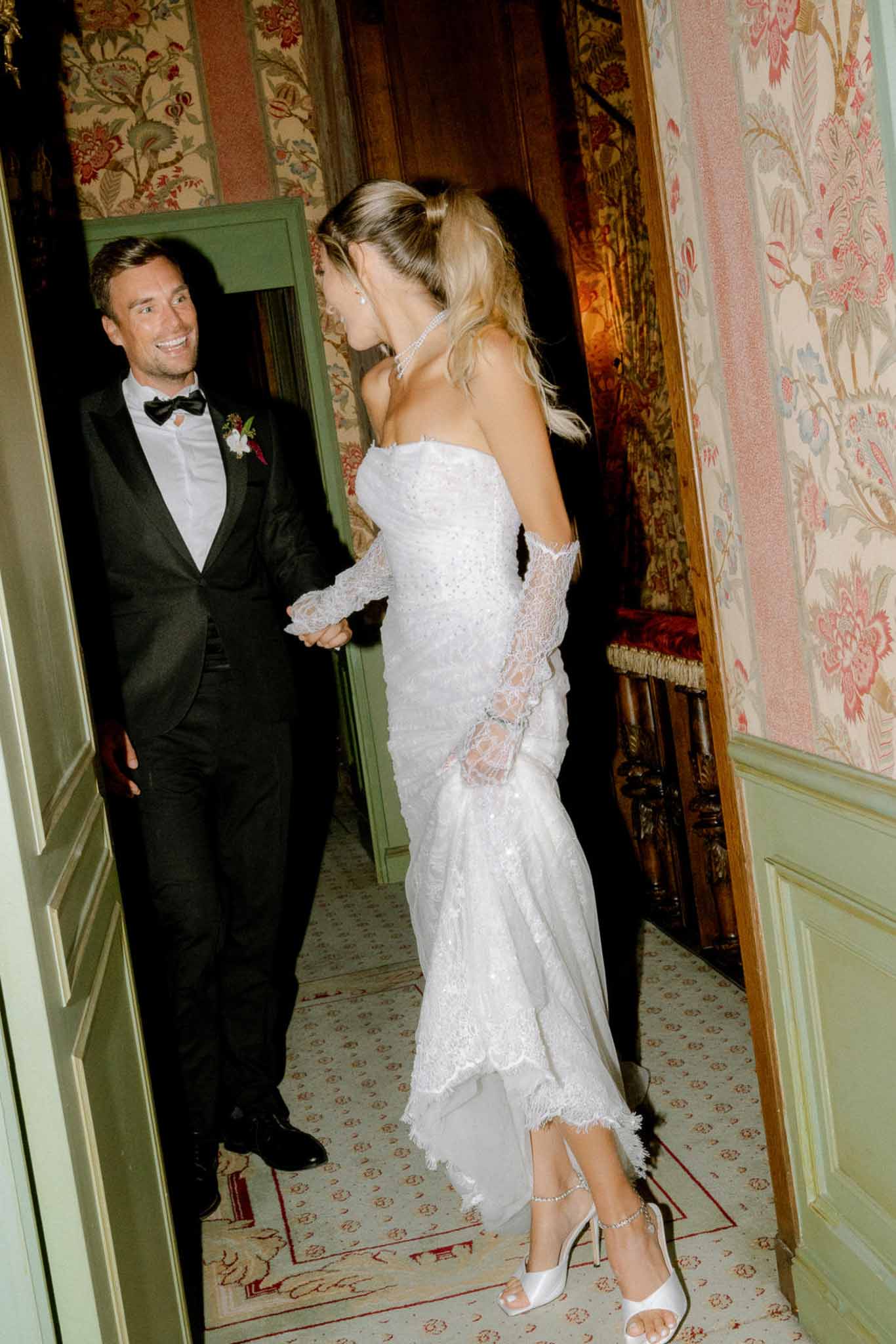 Bride and groom walking hand in hand