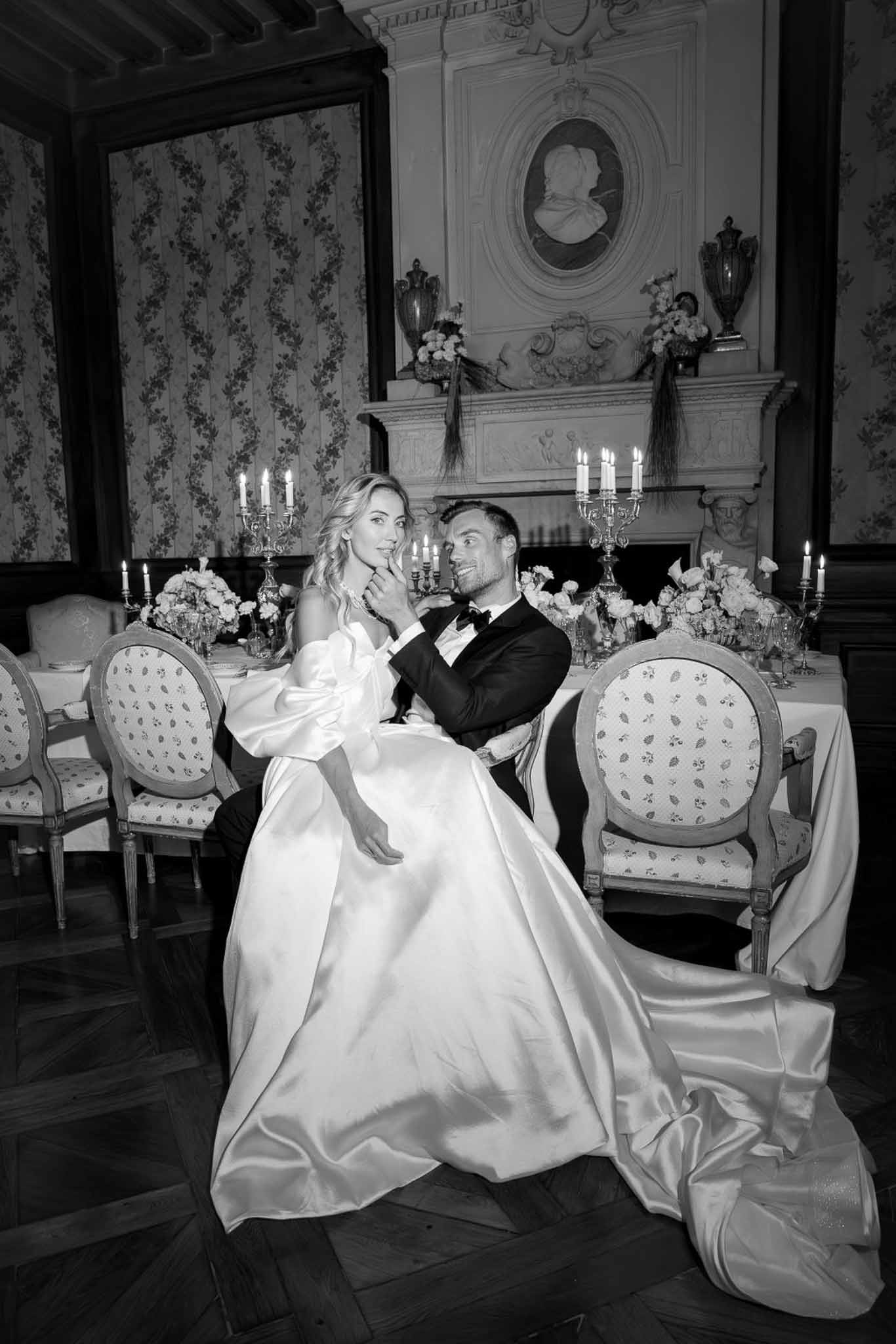 Black and white photo of wedding reception table setting