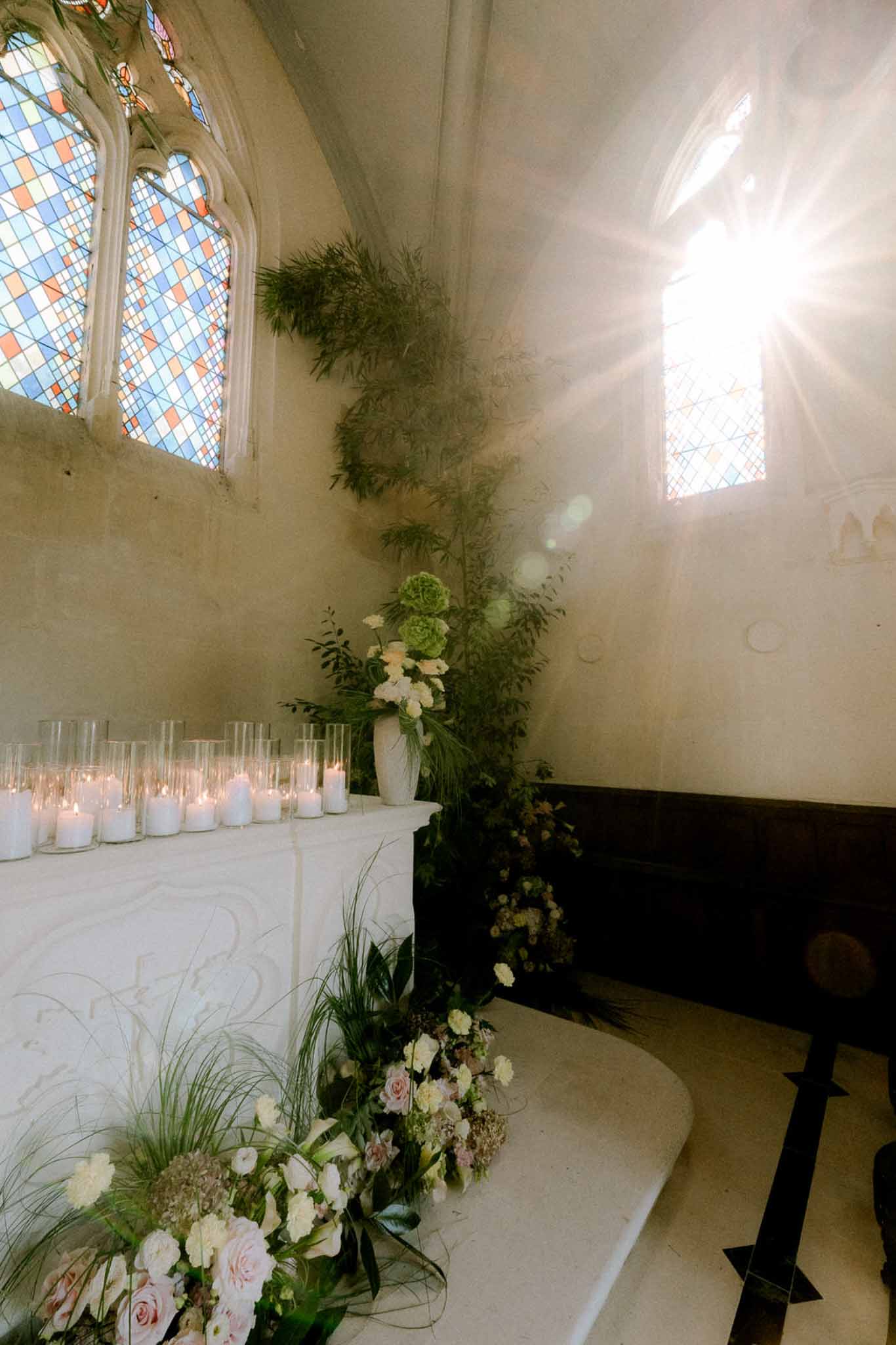 Wedding ceremony setup in a garden with white roses