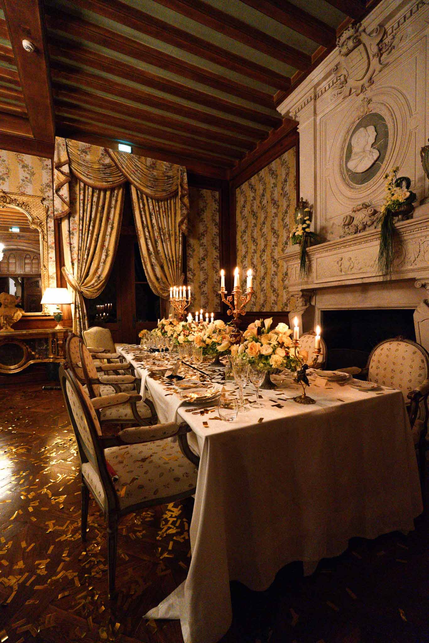 Wedding reception table setting with white roses