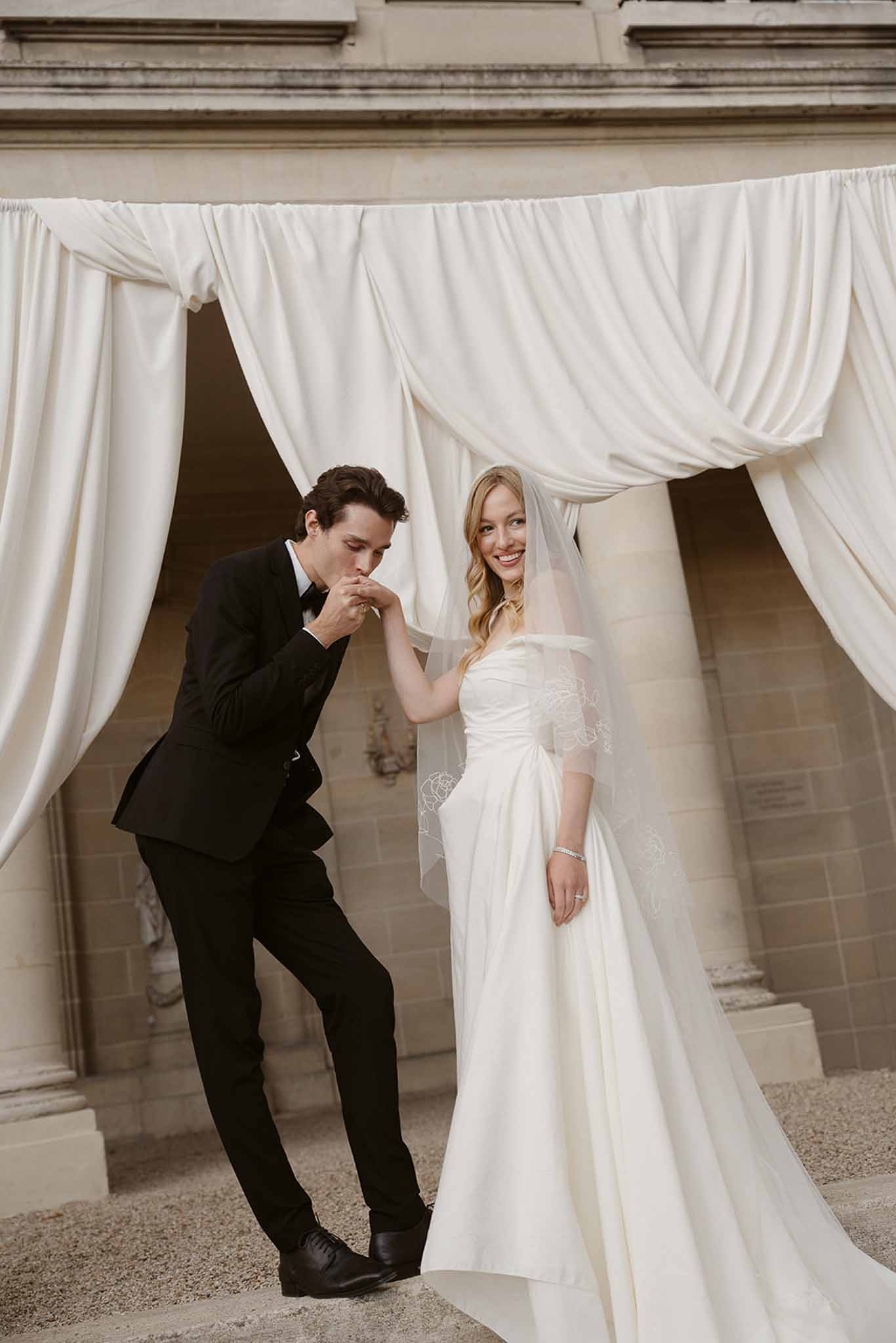 Bride and groom kissing