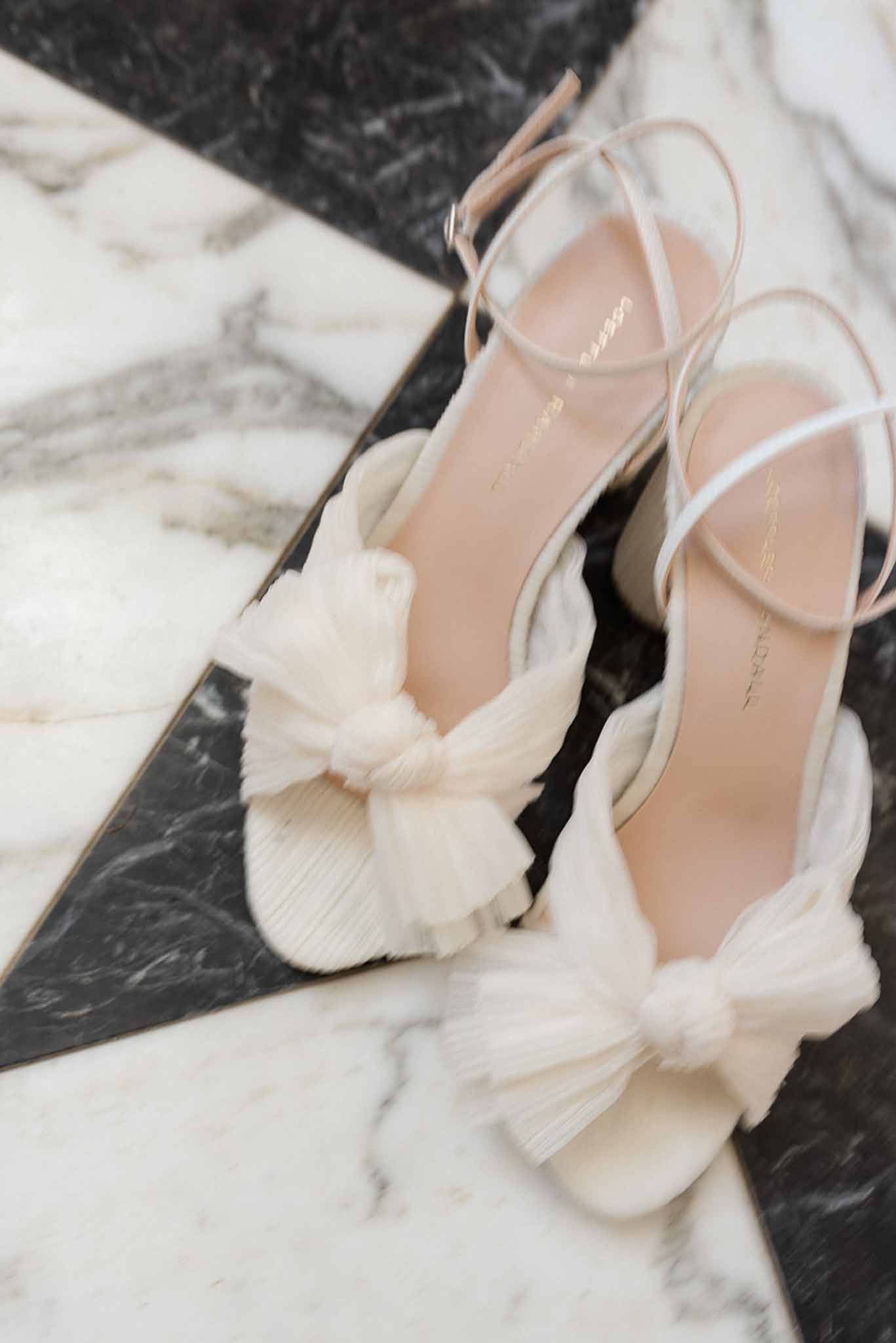 Black and white photo of wedding rings