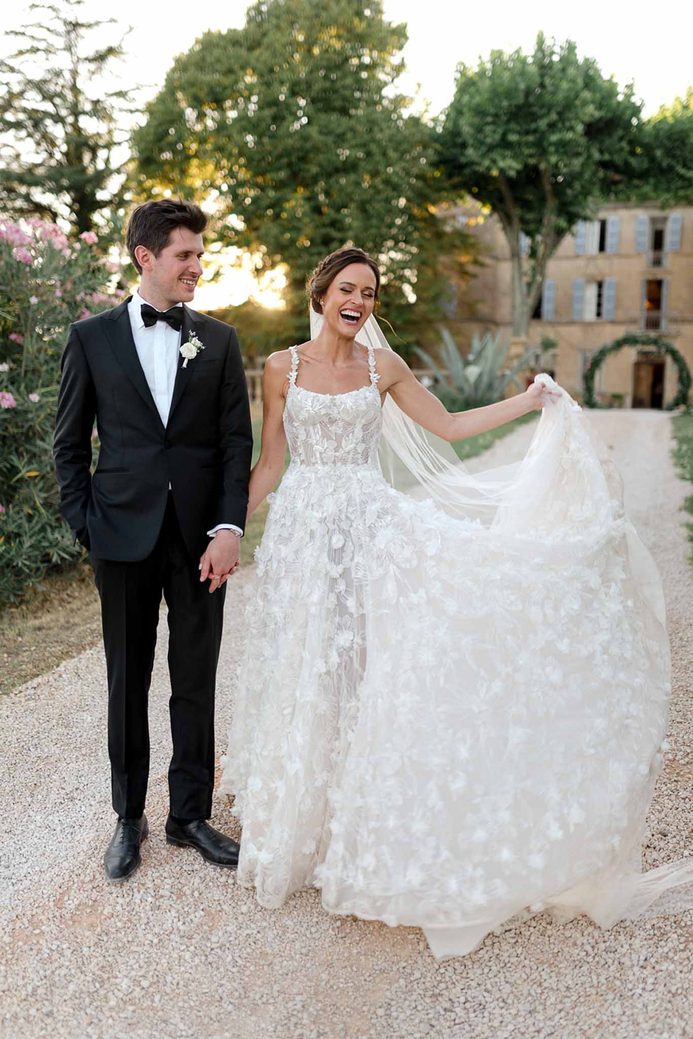 Bride and groom walking hand in hand