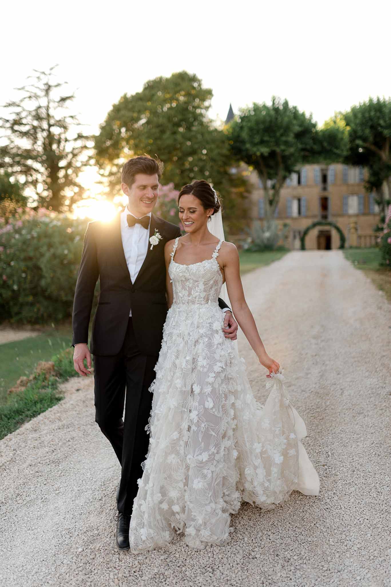Bride and groom walking hand in hand