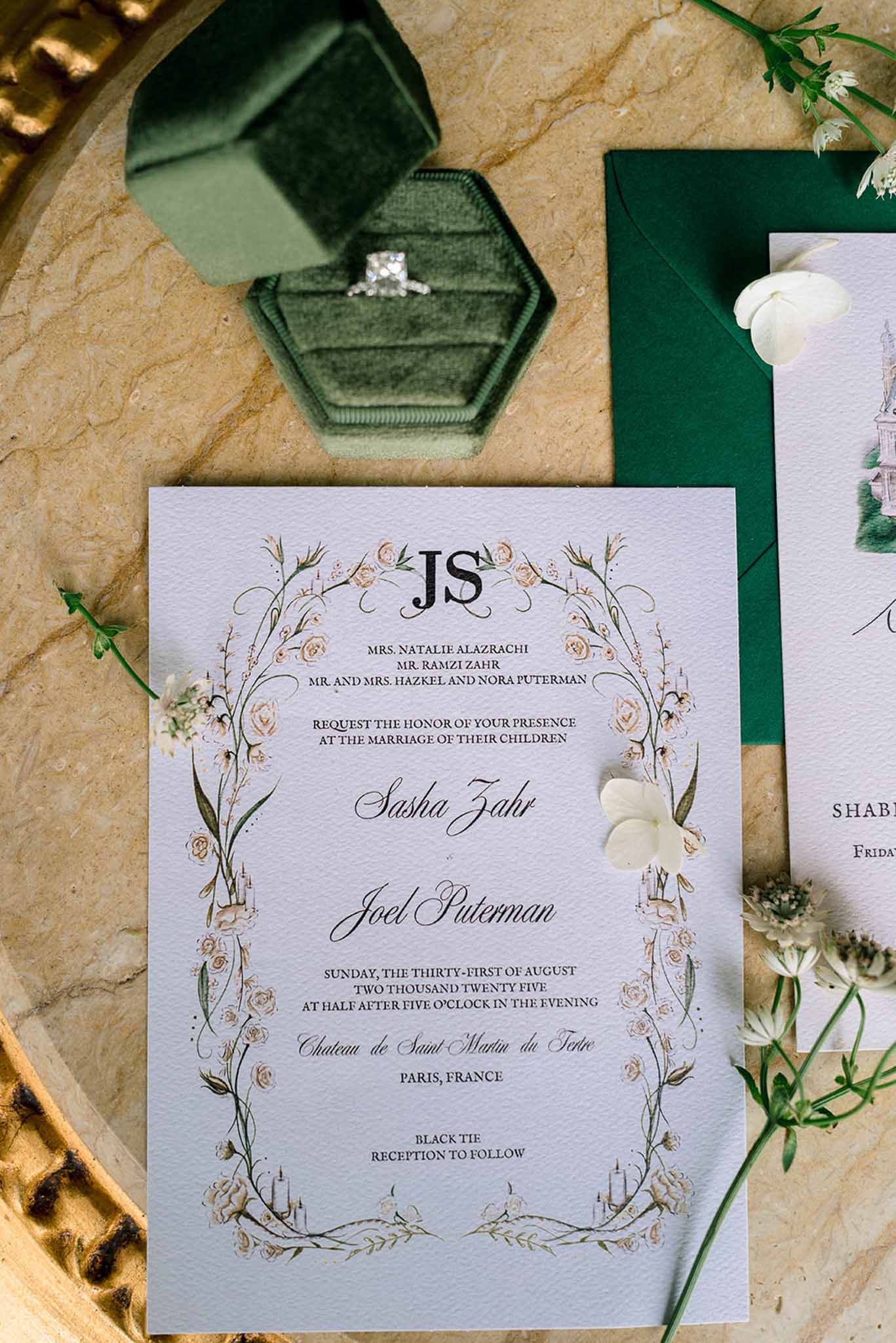 Botanical illustrated invitation suite with emerald velvet ring box and princess-cut diamond on marble gold tray